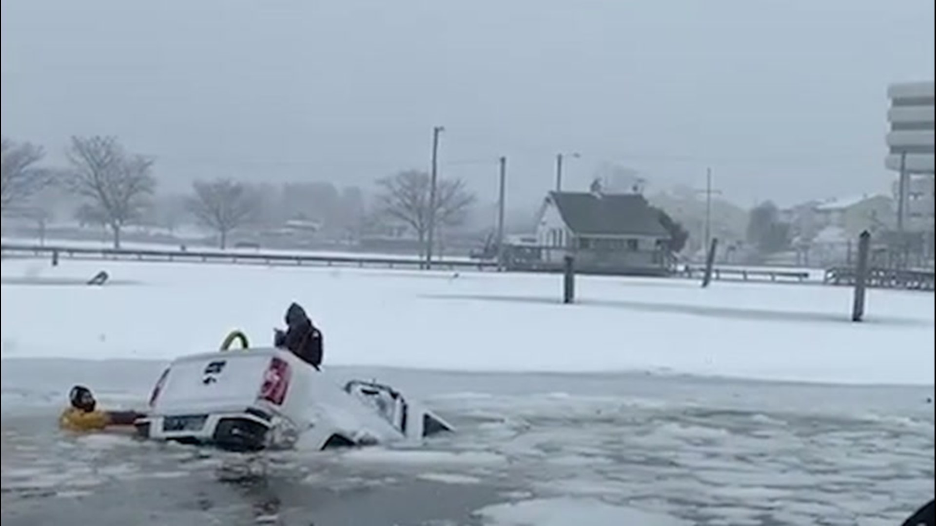 On Monday, Feb. 1, emergency crews rescued two people after a truck plunged into icy water at Cummings Park in Stamford, Connecticut, during a snowstorm.