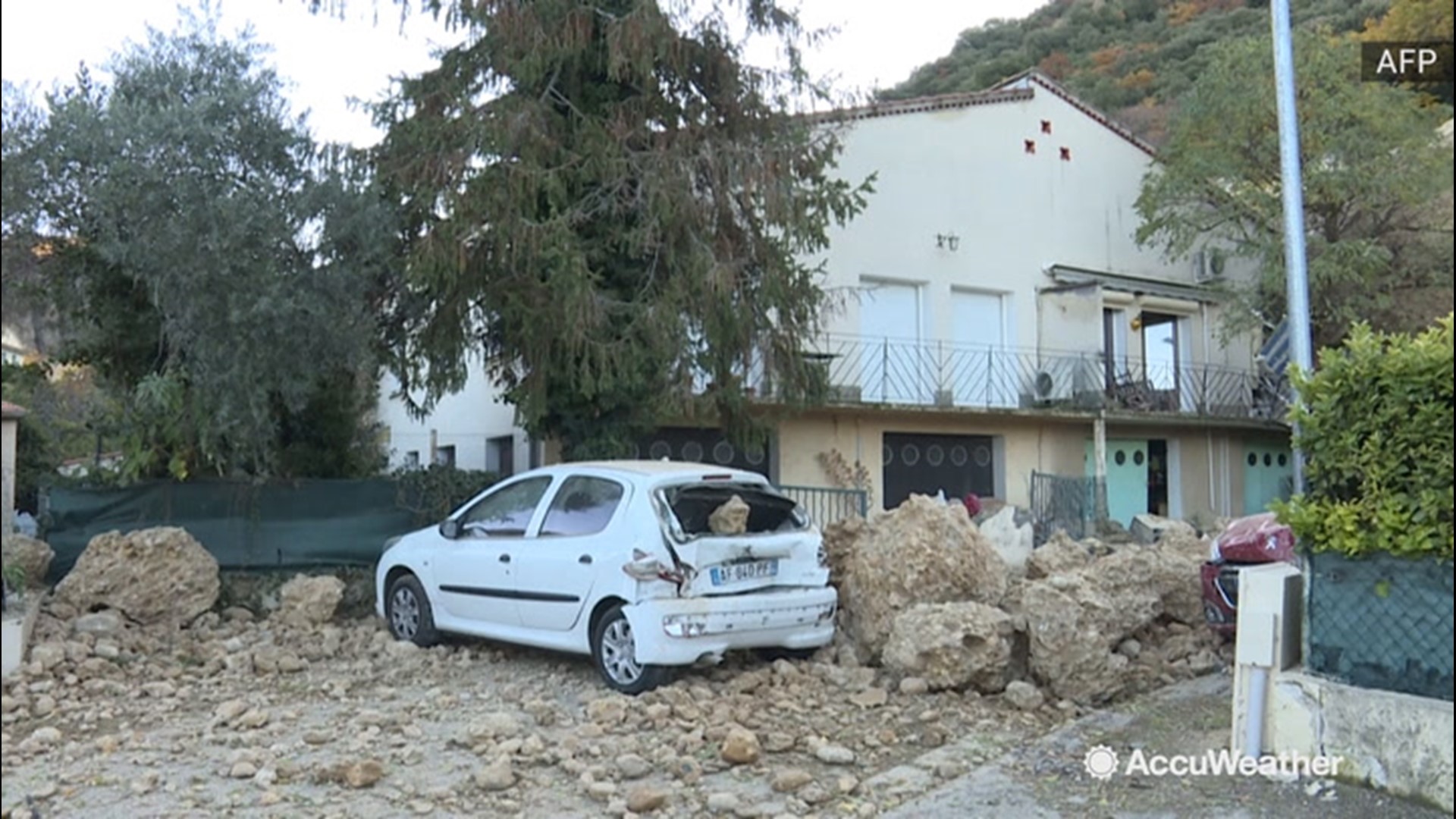 Homes were destroyed after a landslide sent massive chunks of rock and other debris racing downhill in Les Mees, France, on Dec. 3.