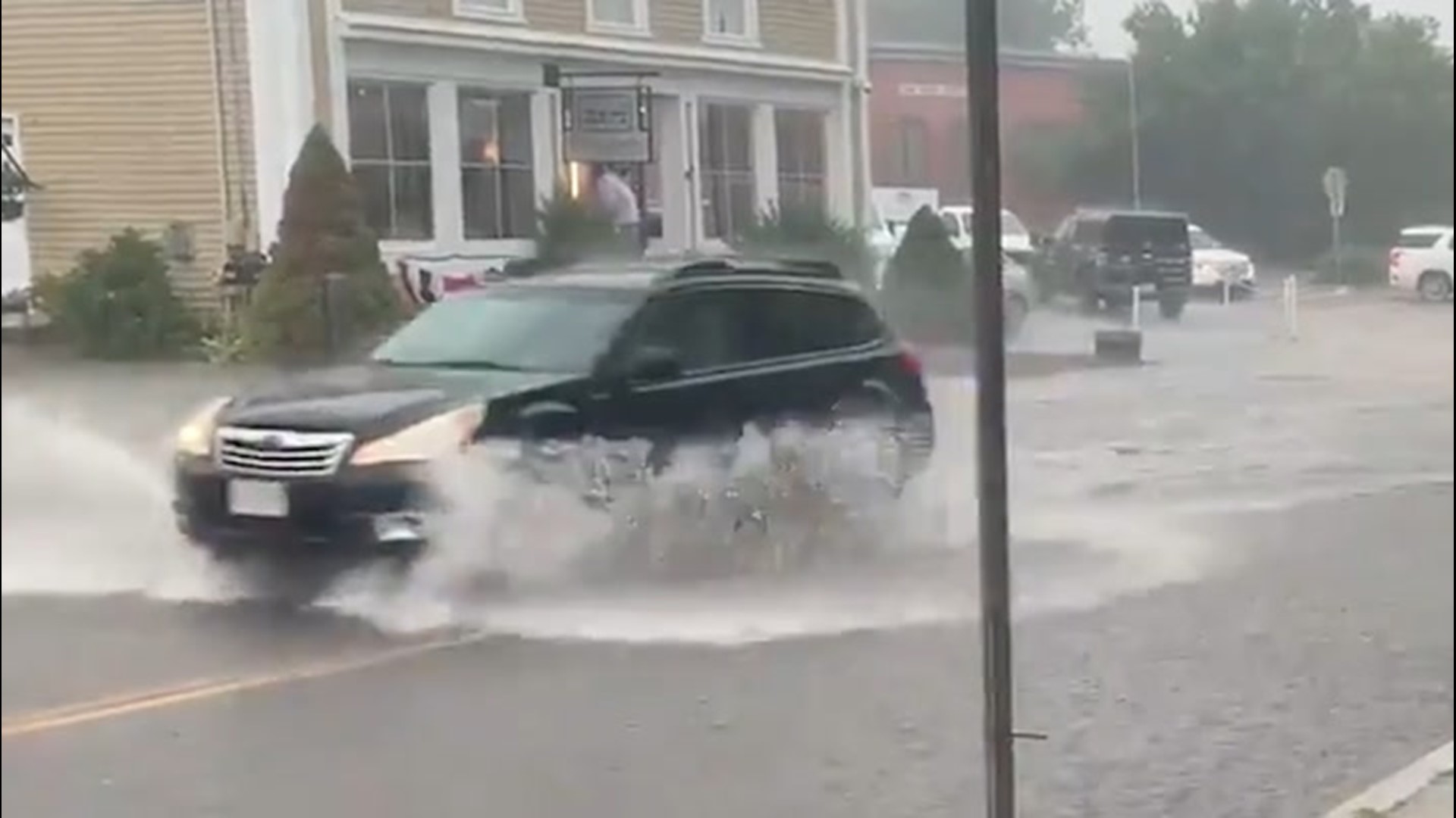 Roads in Wakefield, Rhode Island, were inundated by floodwaters on July 14 after a fast-moving storm bought heavy downpours in the area.
