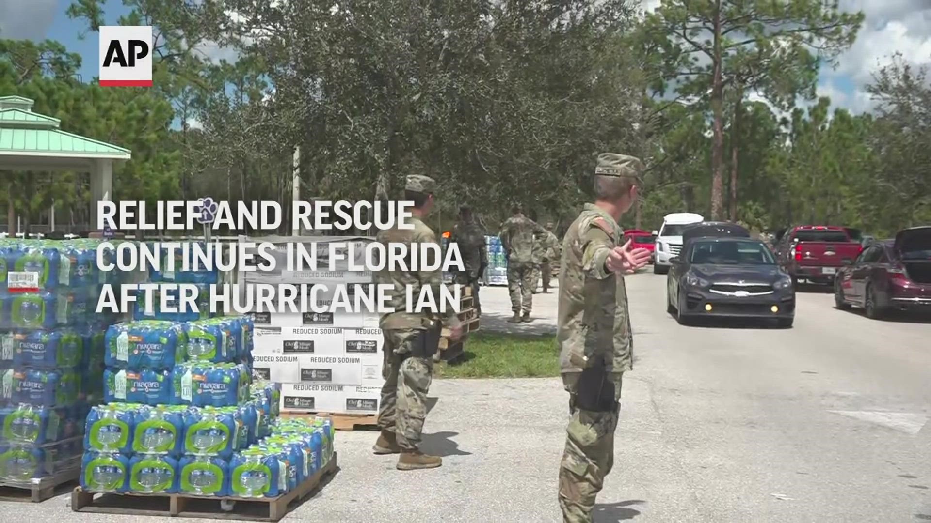 WATCH: Members of the National Guard distribute relief packages in the aftermath of Hurricane Ian.