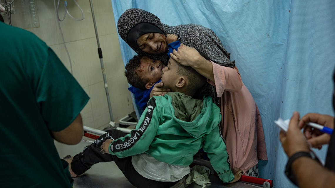 Israel raids Gaza’s largest hospital, where hundreds shelter