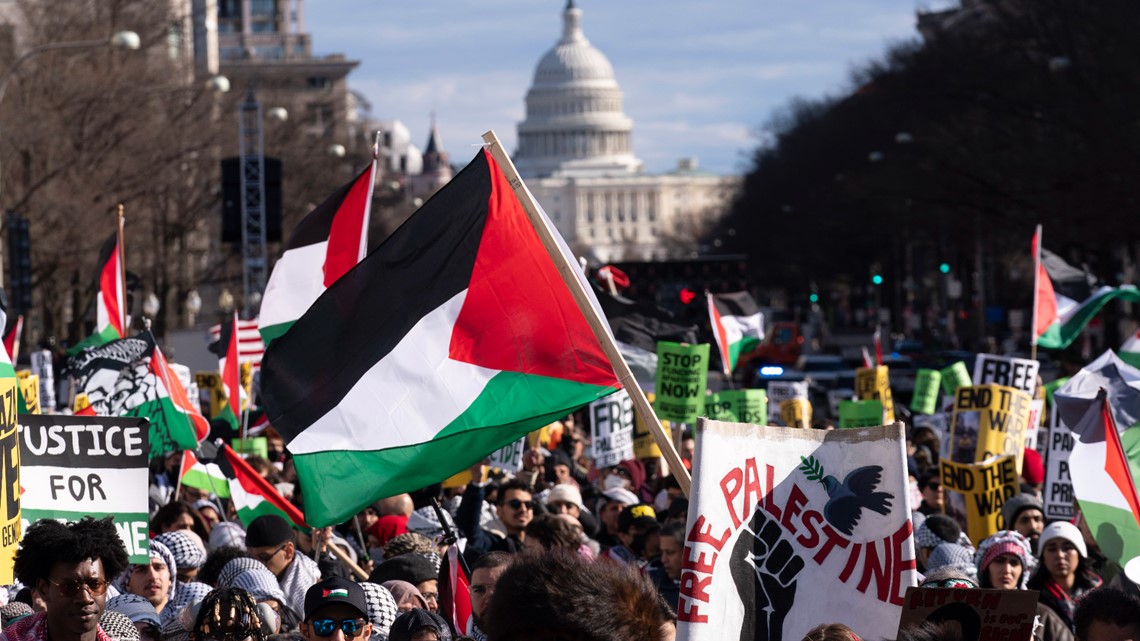 A global day of protests draws thousands in Washington