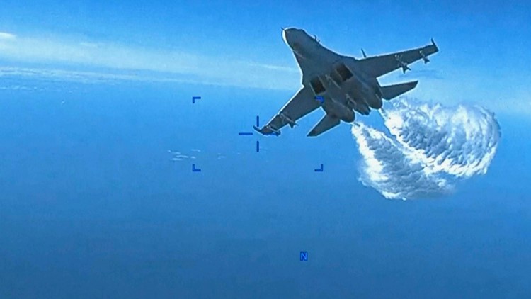 WATCH: Russian plane dumps fuel on US drone over Black Sea