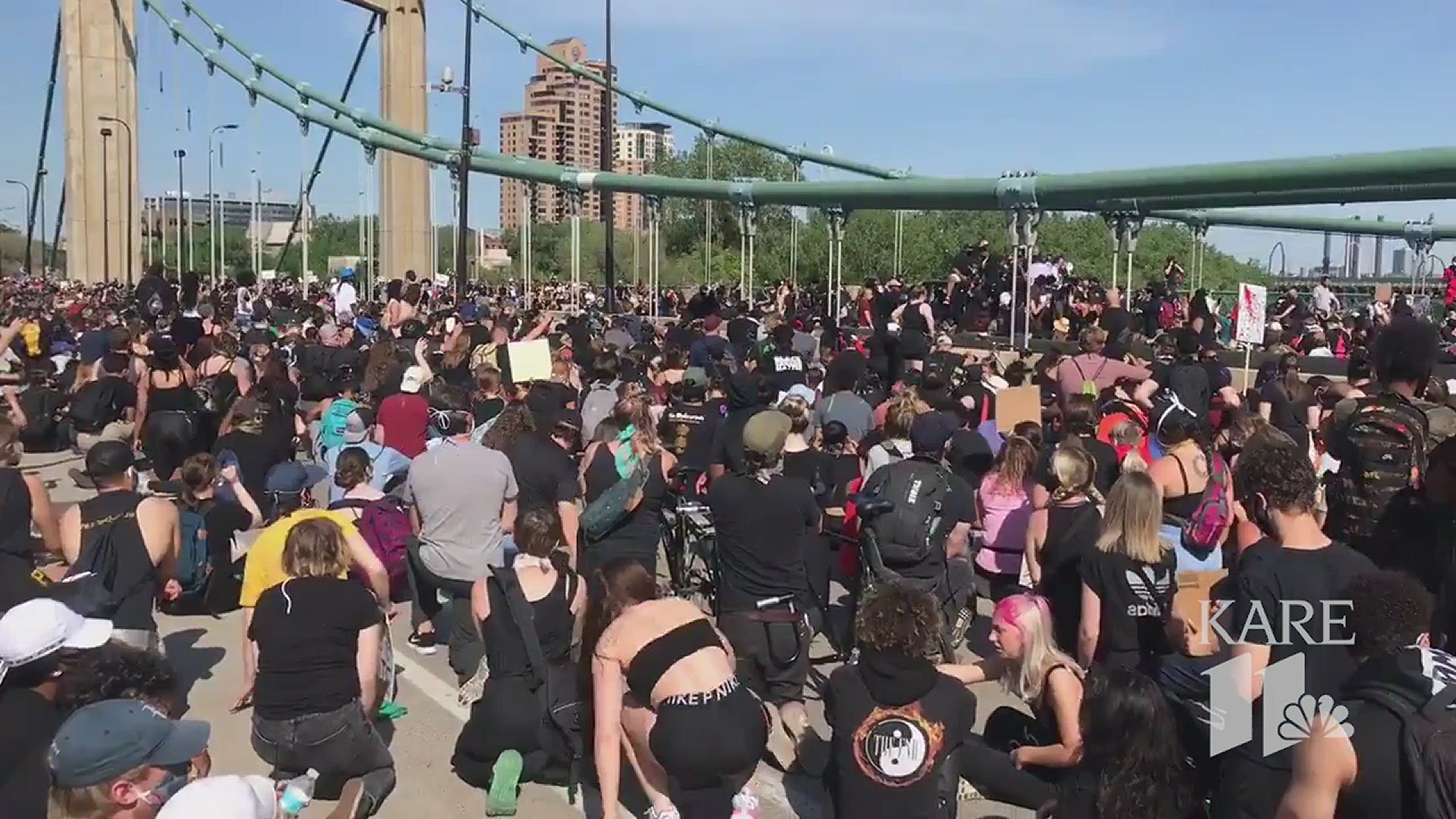 KARE 11's Boyd Huppert captured this moment of demonstrators taking a knee while chanting “I can’t breathe” on Hennepin Avenue Bridge in Minneapolis.