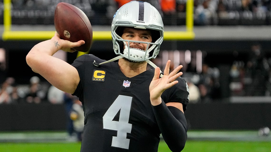 Washington Football Team quarterback Taylor Heinicke (4) warms up before an  NFL football game against the New York Giants on Sunday, Jan. 9, 2022, in  East Rutherford, N.J. (AP Photo/Adam Hunger Stock