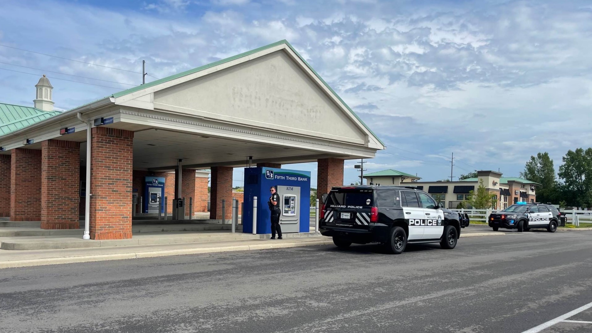 Both central Ohio men are charged with aiding and abetting a bank robbery and the use of a firearm during a crime of violence.