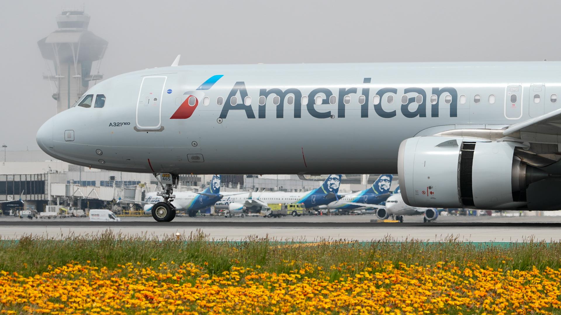 A flight attendant who tried to block the man was injured in the altercation, officials said.