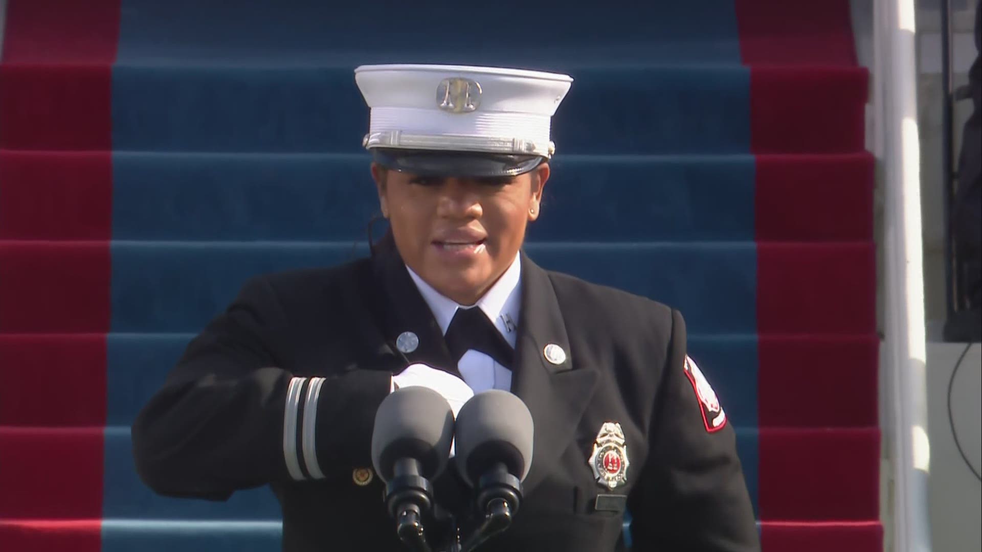 Fire Captain Andrea M. Hall said and signed the Pledge of Allegiance in American Sign Language during the inauguration of Joe Bide.