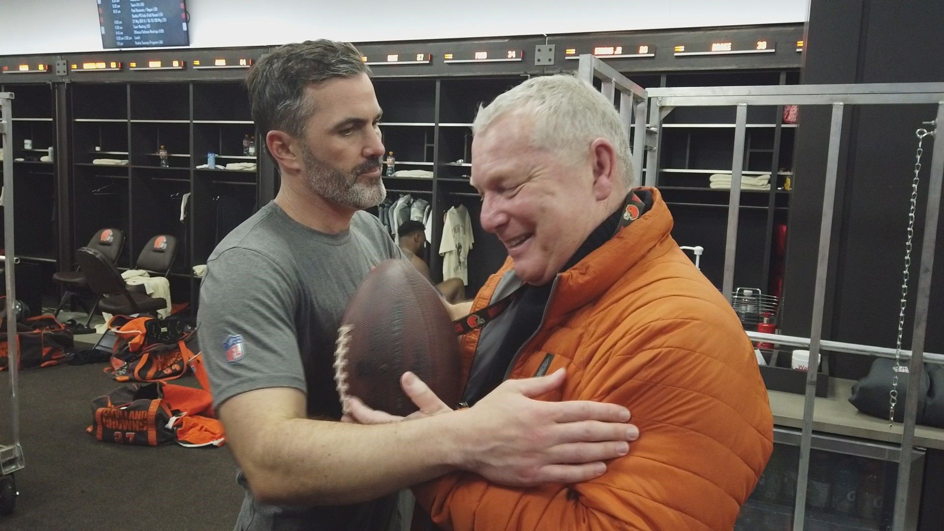 Voice of the Browns Jim Donovan is awarded the game ball after returning to the radio booth!