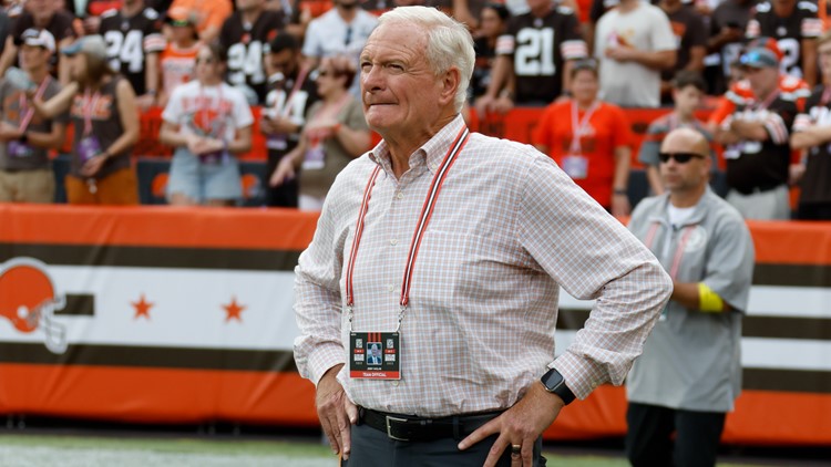 Cleveland Browns plan to permanently ban fan who threw bottle at owner Jimmy Haslam during Sunday's game; police charge suspect with assault