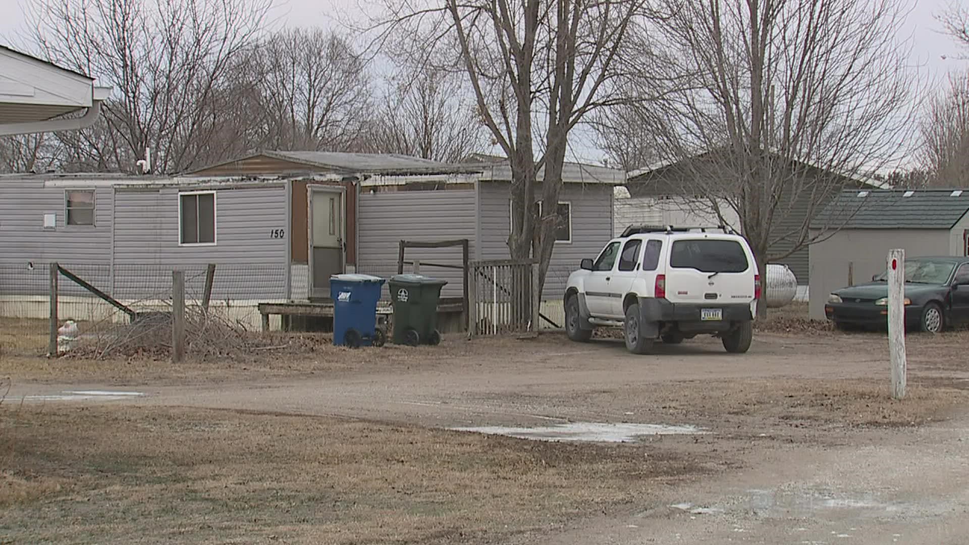 The dogs were living in the home with an "excessive" amount of animal waste and lack of food and medical care, according to the Muscatine Police Department.