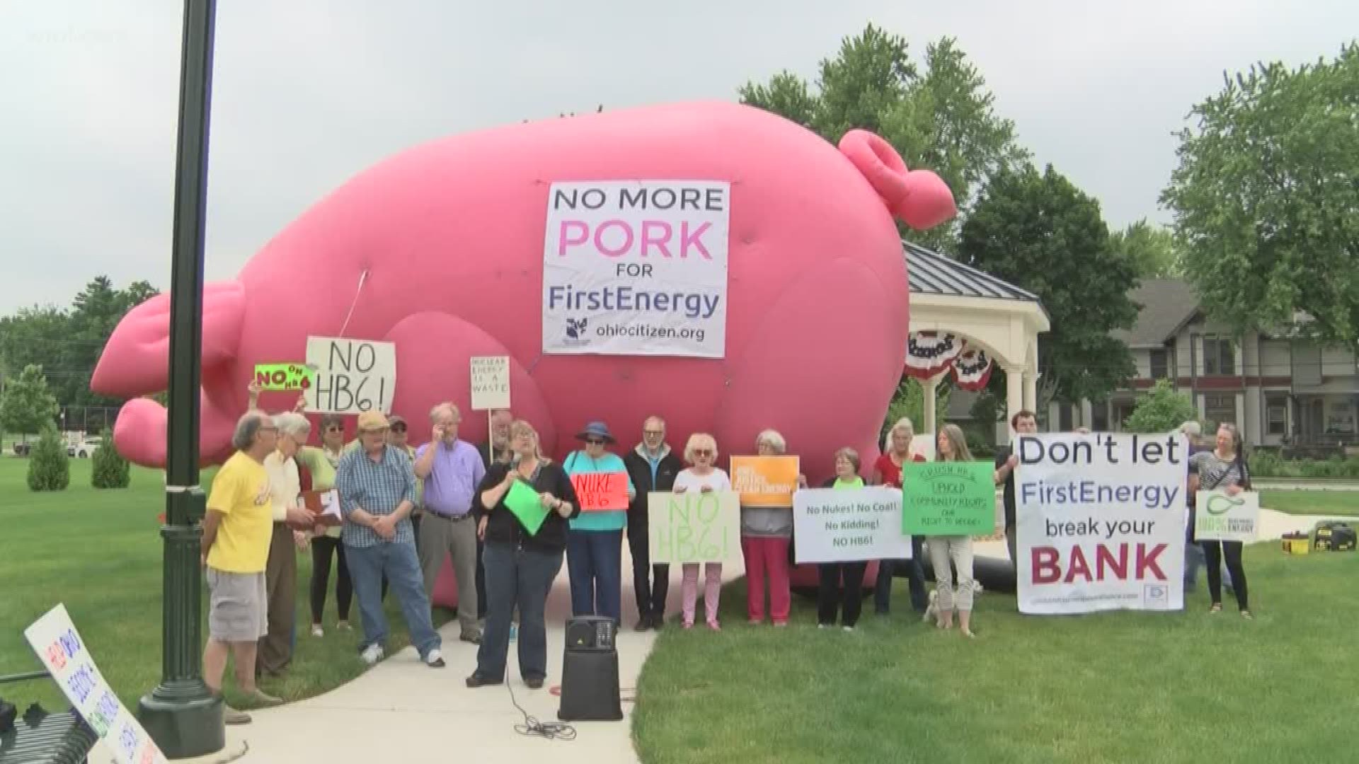 Protesters say bill will harm environment and cost city hundreds of thousands of dollars every year. Bowling Green has invested in green energy with its solar field and wind turbines.