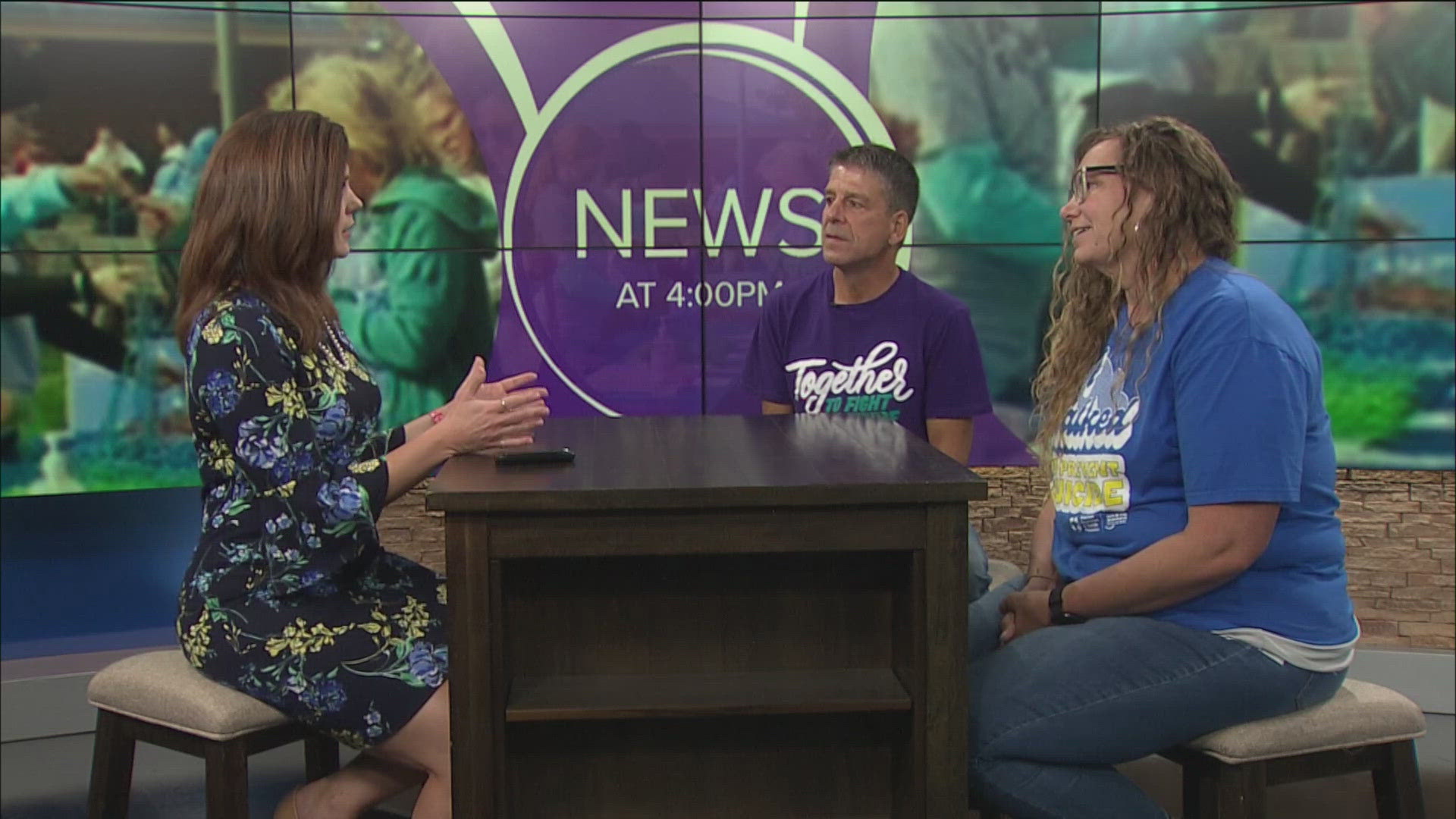 Megan Scott and Joe Hoppe of the American Foundation for Suicide Prevention talk about the community walk in Toledo.