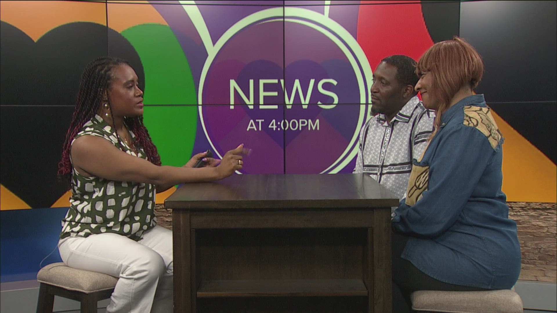 James Michael Jones, the principal at Robinson Elementary, and Kathleen Greely with Community Reinvestment Coalition talk about upcoming Juneteenth events.