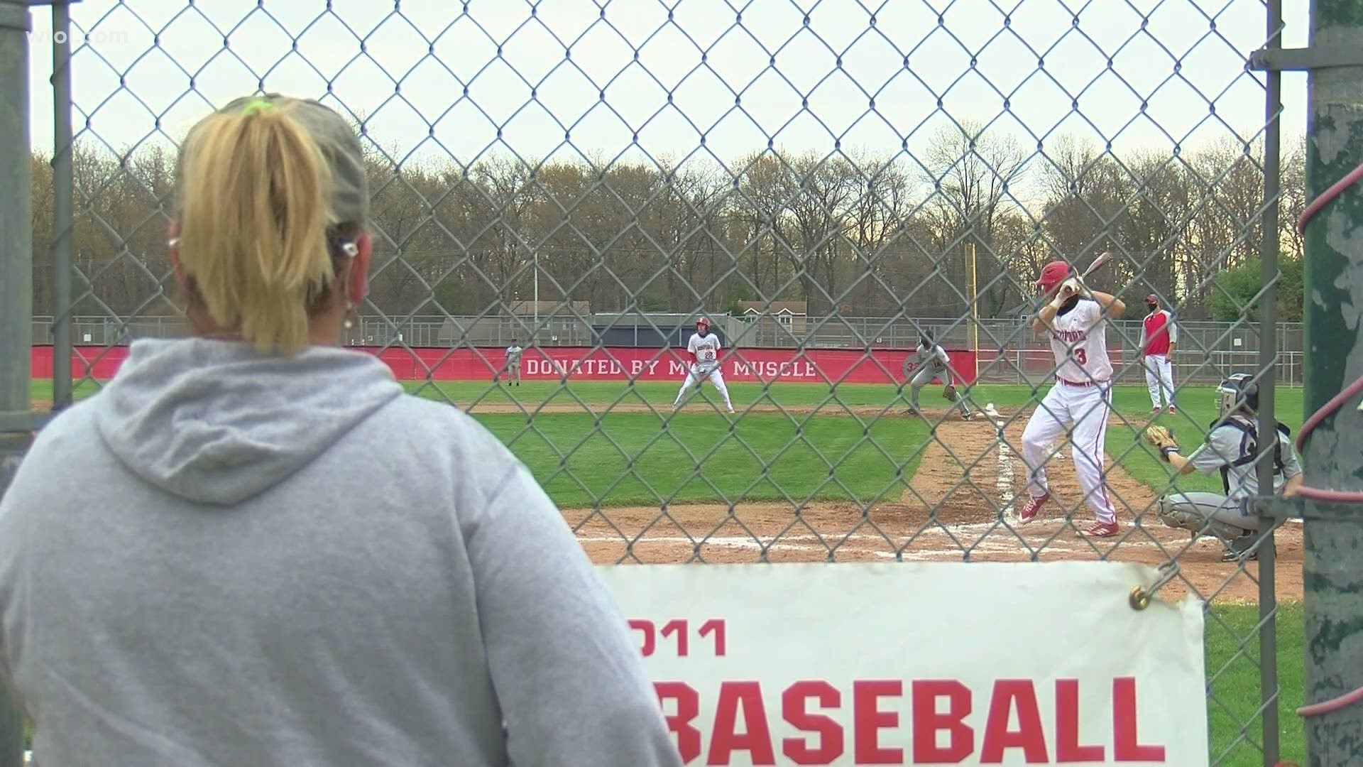 Michigan Gov. Whitmer suggested, not mandated, a two-week pause in sports as cases in the state climb. In Bedford, baseball continues with precautions and protocols.