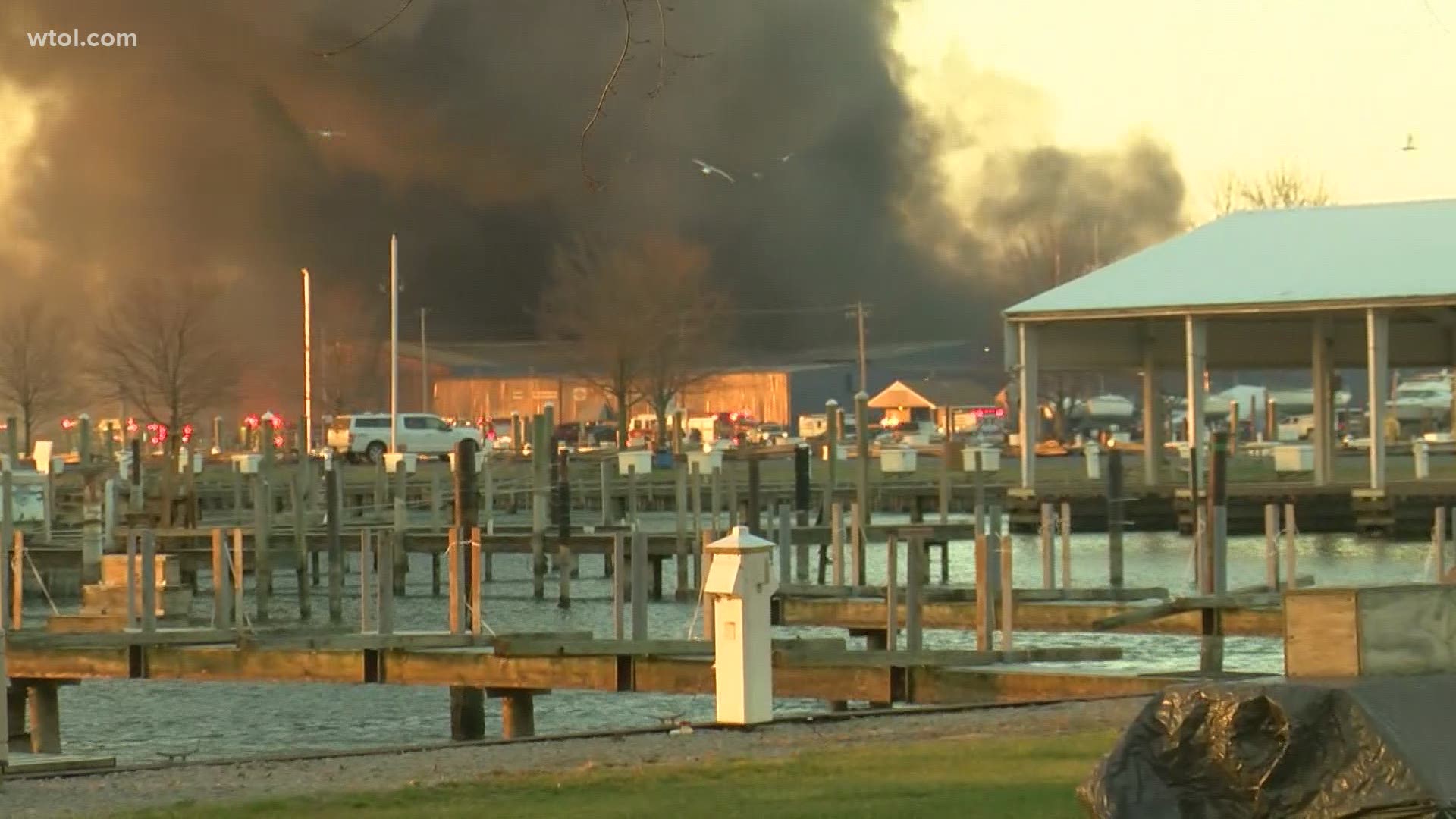 The building on fire is a rack and launch building where boats are stored in the winter.