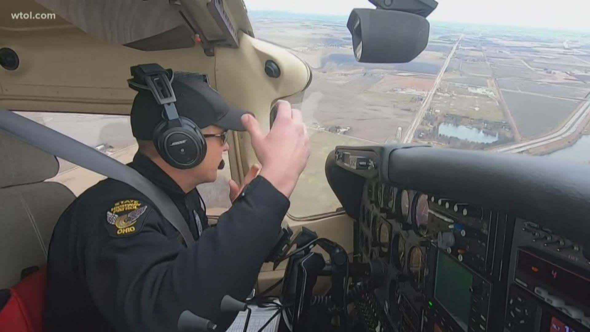 Exclusive ride: WTOL was up in the air with troopers while they caught distracted drivers from an airplane.