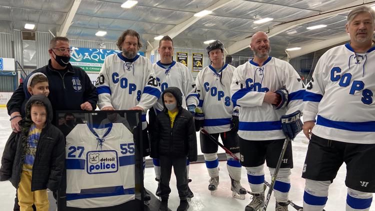 Police face off in charity hockey game with a goal of honoring fallen officers and protecting others