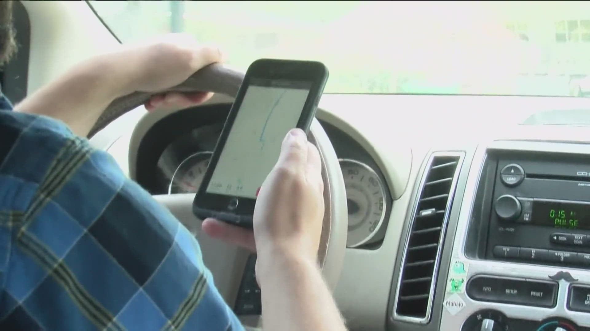 If you're caught by law enforcement on your phone while driving, you can be pulled over and ticketed.