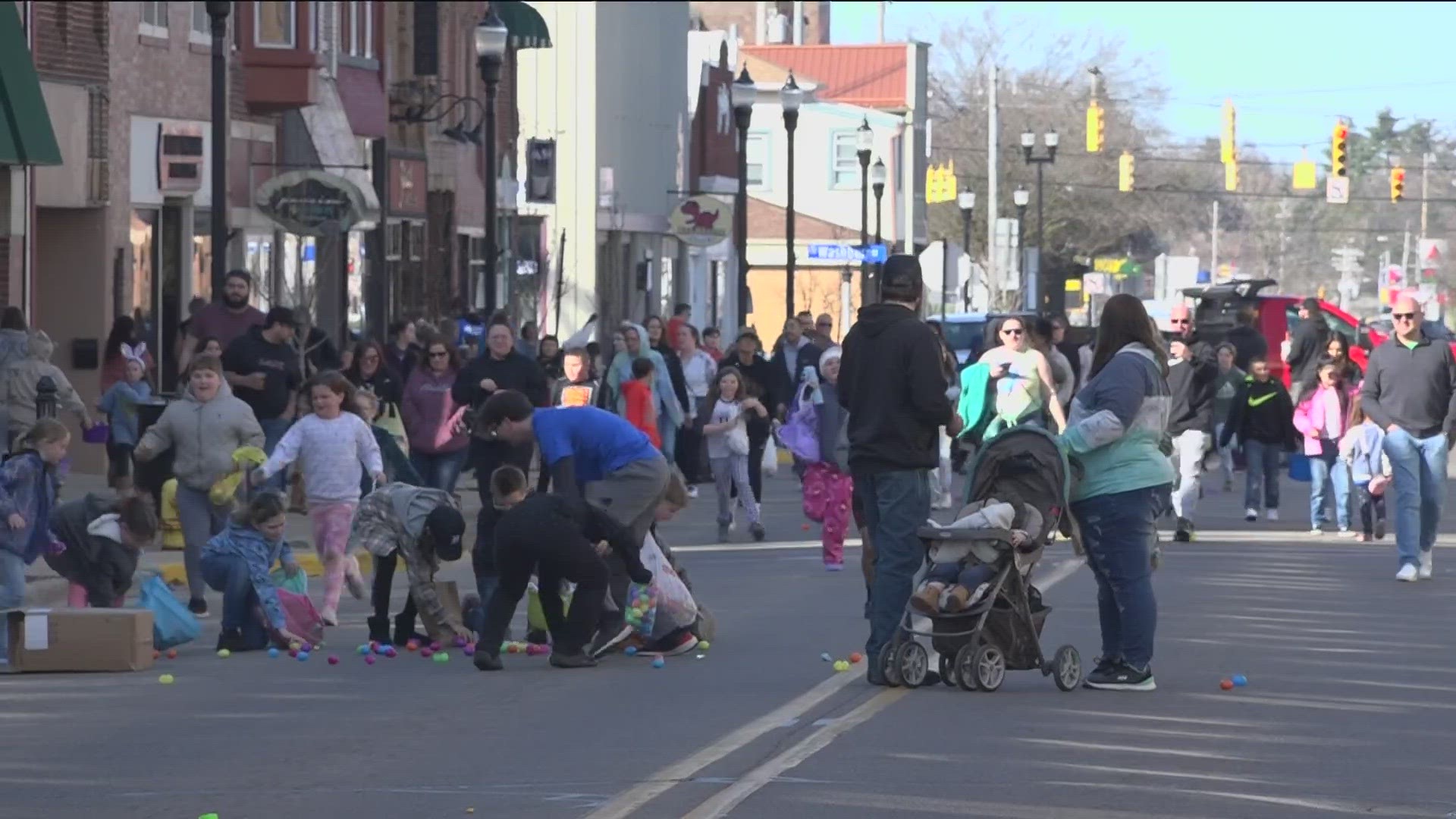 Thousands of eggs were hidden throughout the four blocks of downtown Adrian on Friday. Adults also participated hunted for 17 eggs in downtown businesses.