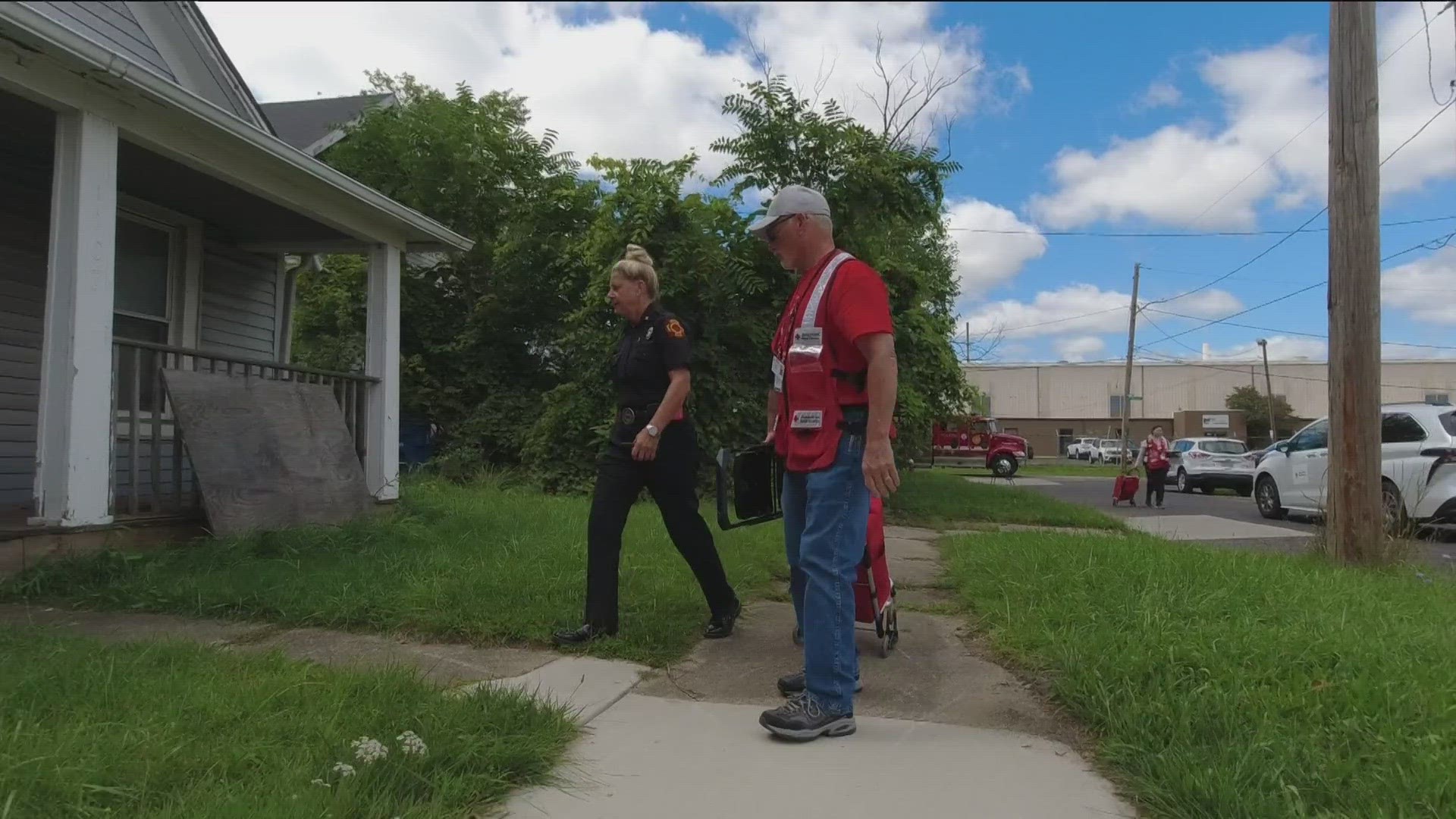 Toledo Fire & Rescue Department and American Red Cross distributed free smoke alarms and answered fire safety questions in the Klondike St. neighborhood Wednesday.