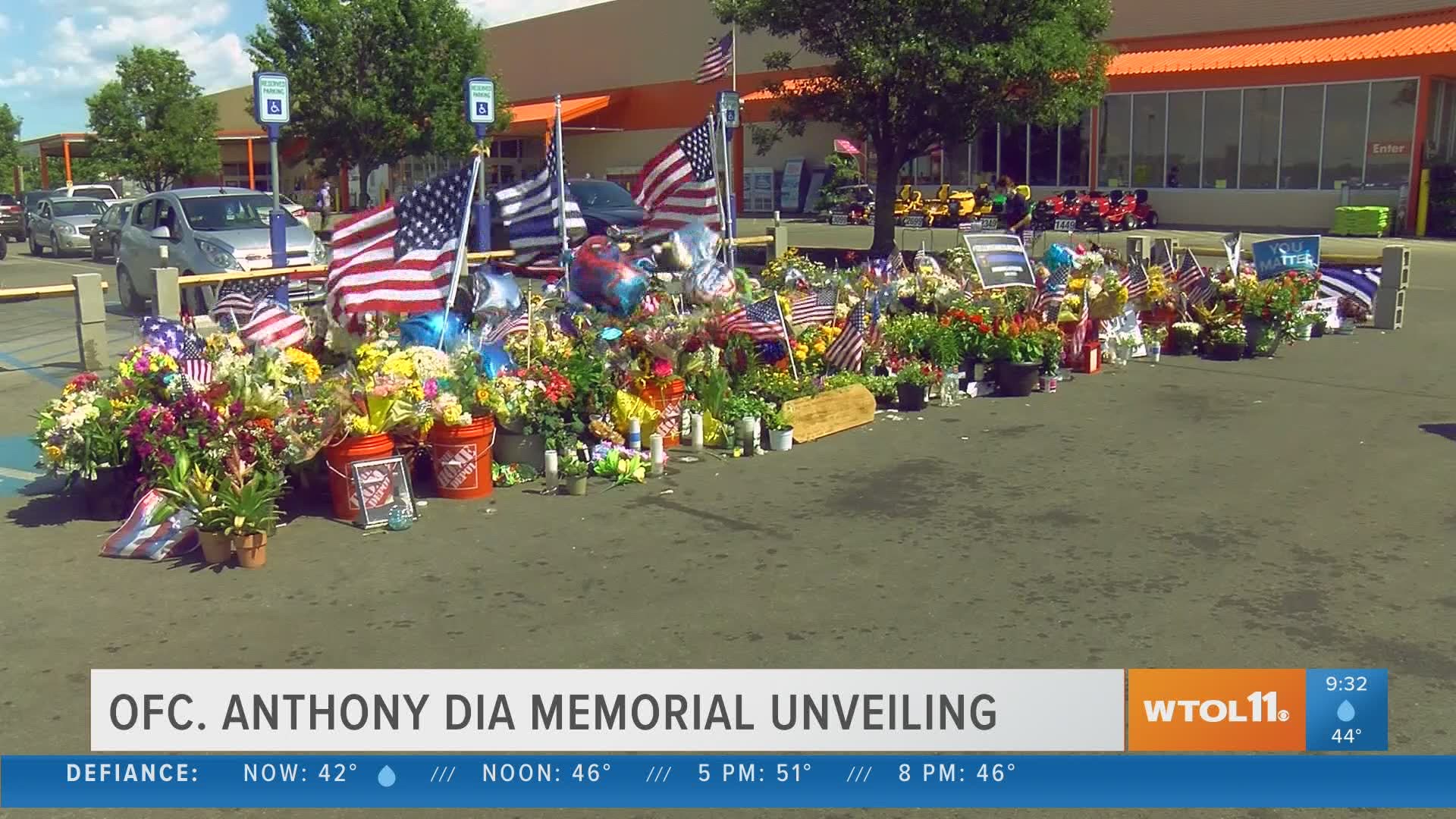 A permanent memorial for Officer Anthony Dia is being unveiled in the parking lot of the Home Depot where he was killed on July 4.