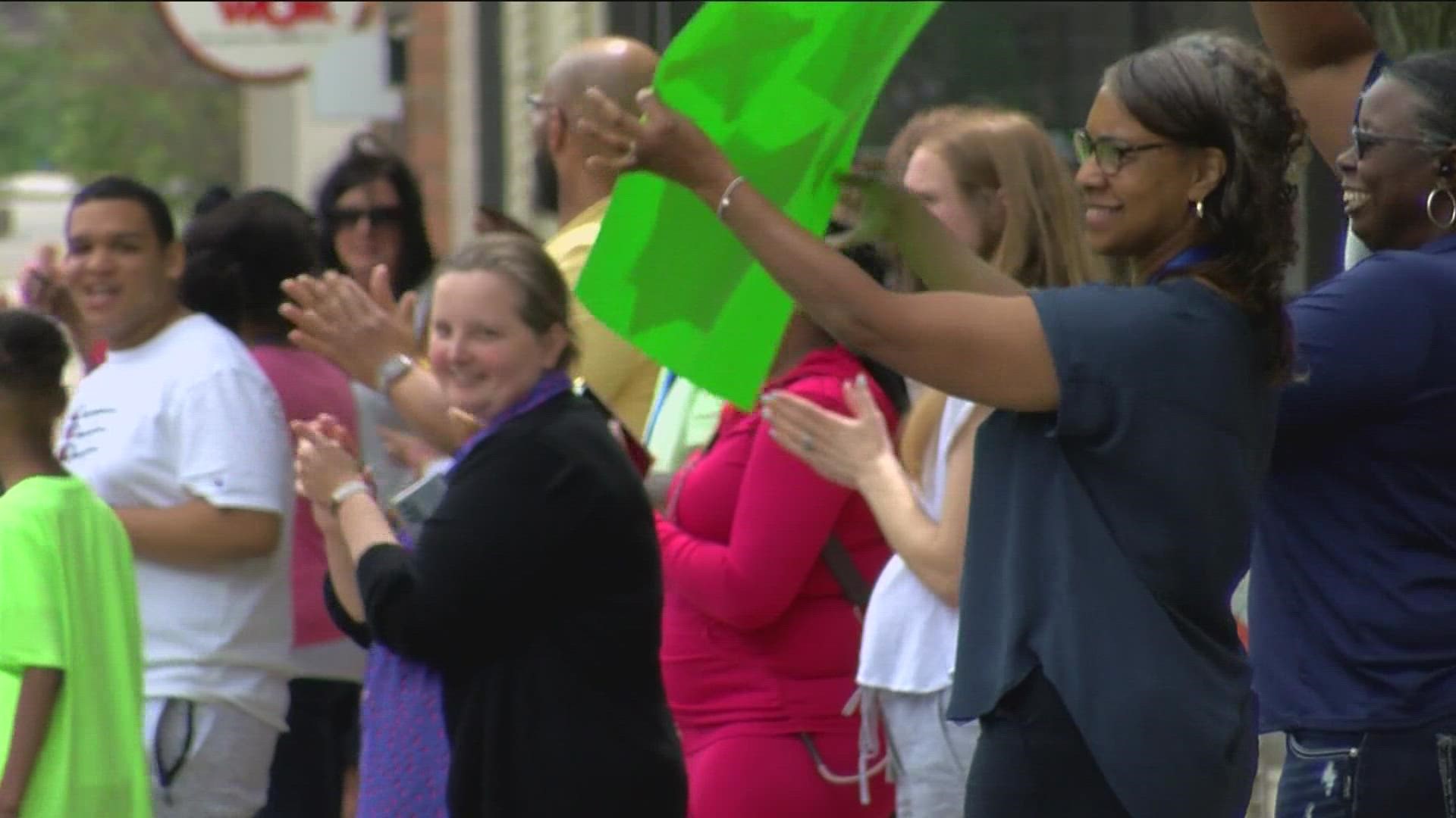 The “graduation parade” happens every spring to celebrate teens who earn either a high school or GED diploma.