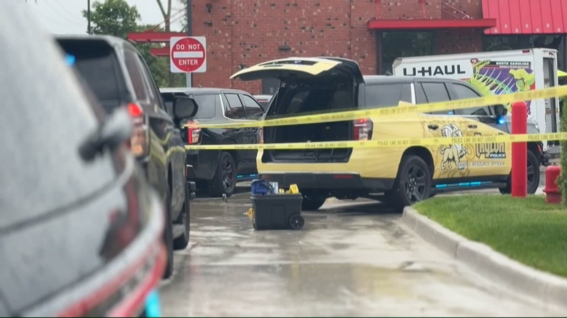 Ohio robbery suspect shot by police after confrontation at Michigan ...