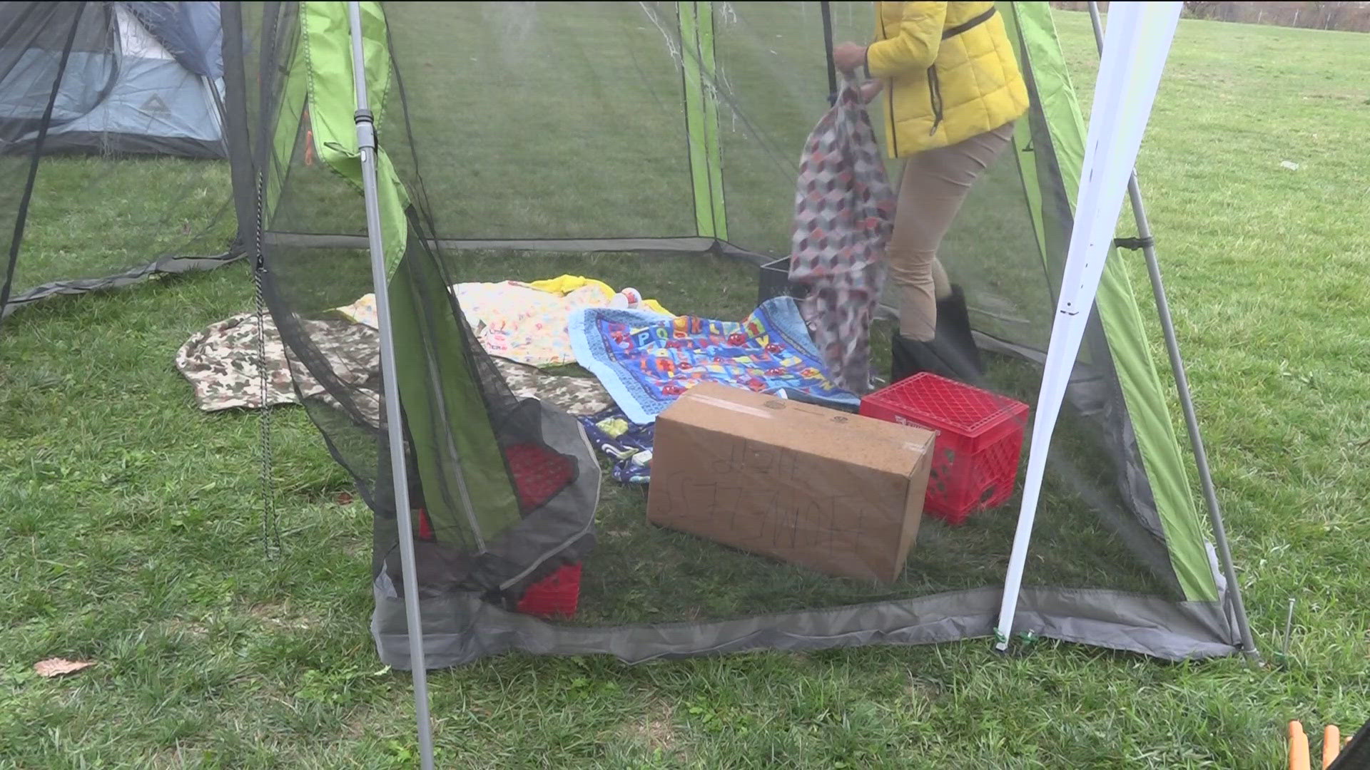 At Leverette Elementary School, tents were set up outside with blankets and boxes for the kids to sit on.