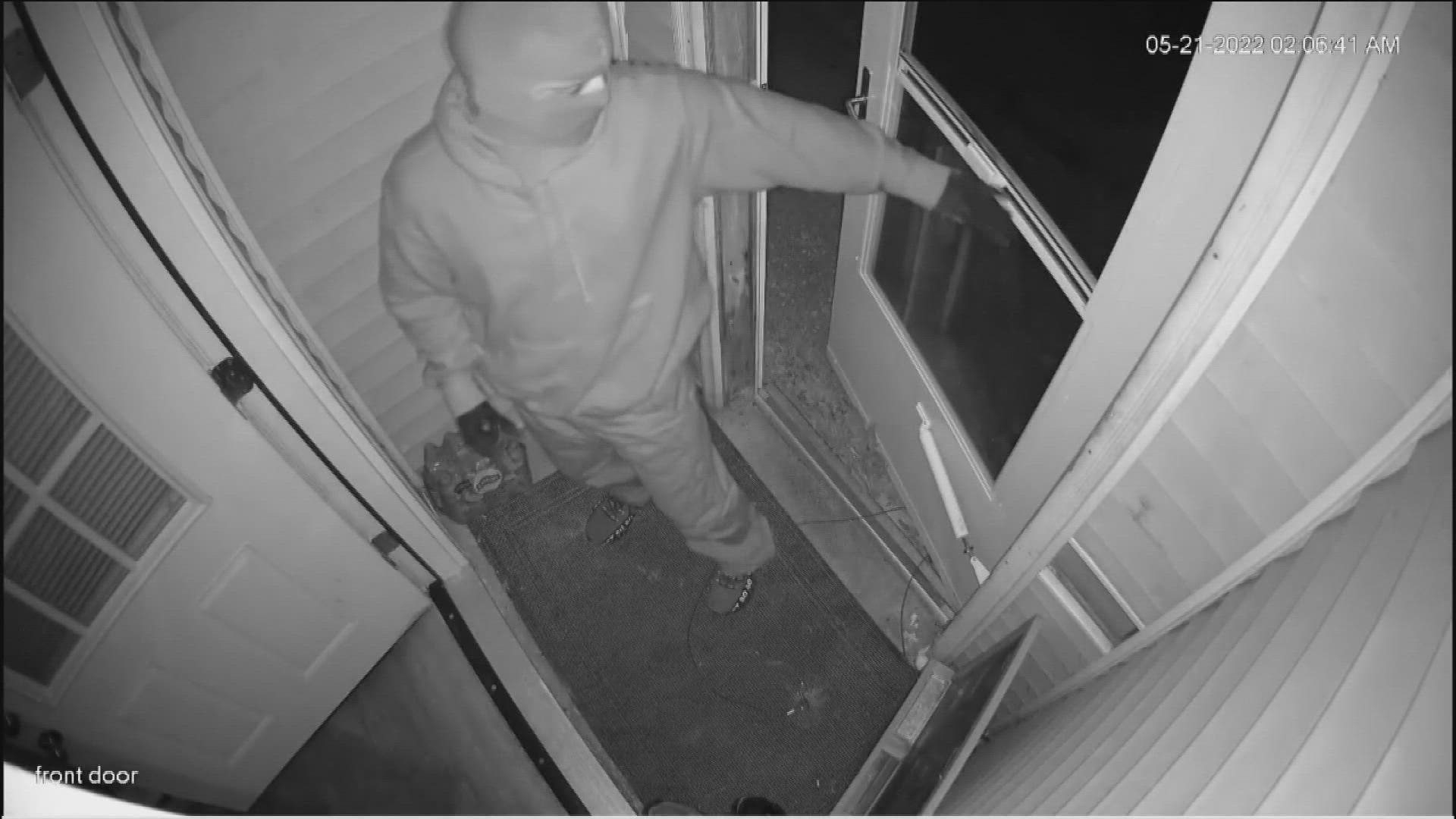 Video shows armed suspects in masks and gloves burglarizing a west Toledo home.