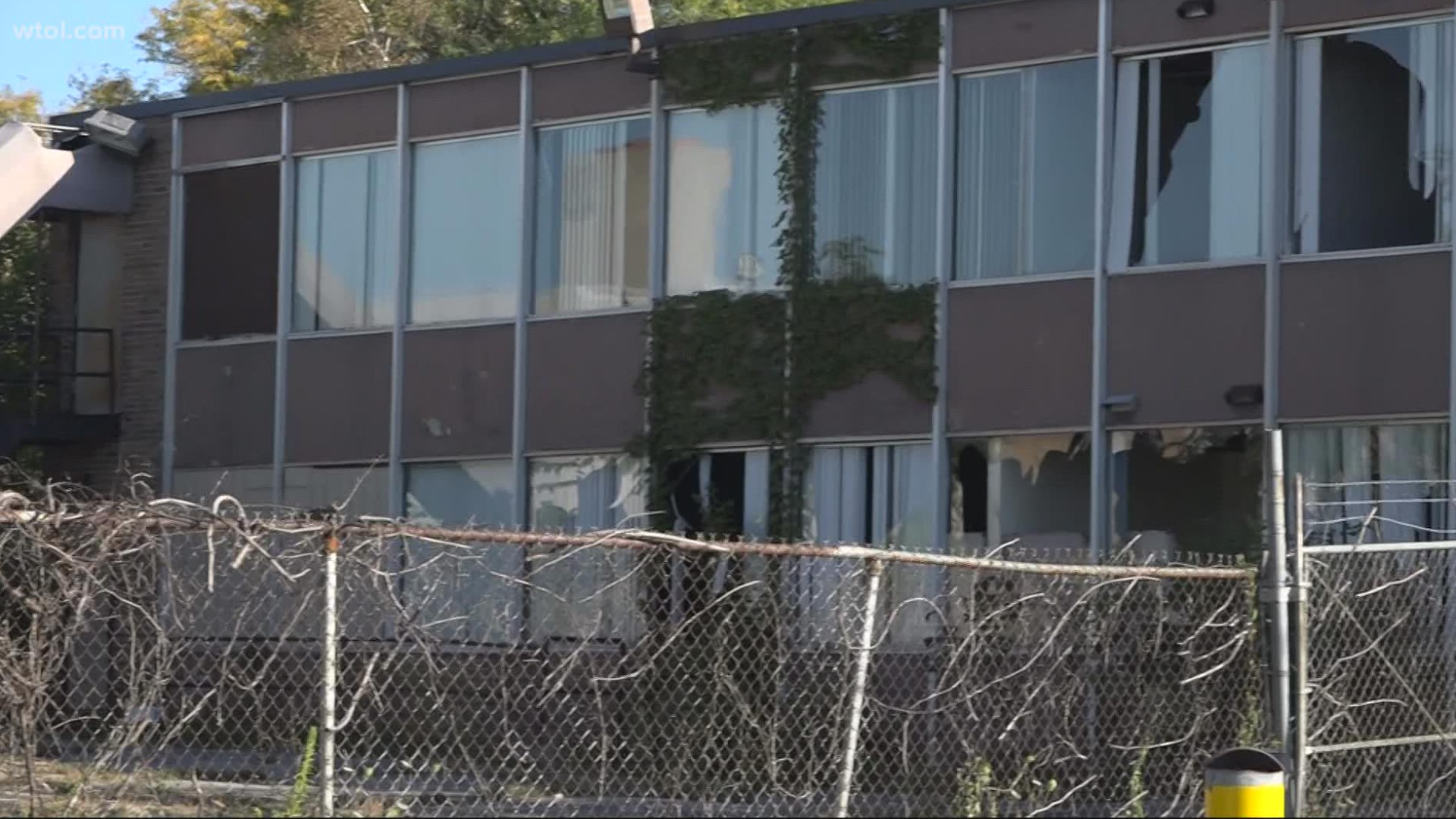 Evan Morrison, a father who lives in the area, says the lock on the gate and cleaned trash is just a band-aid after the city declared the building a public nuisance.