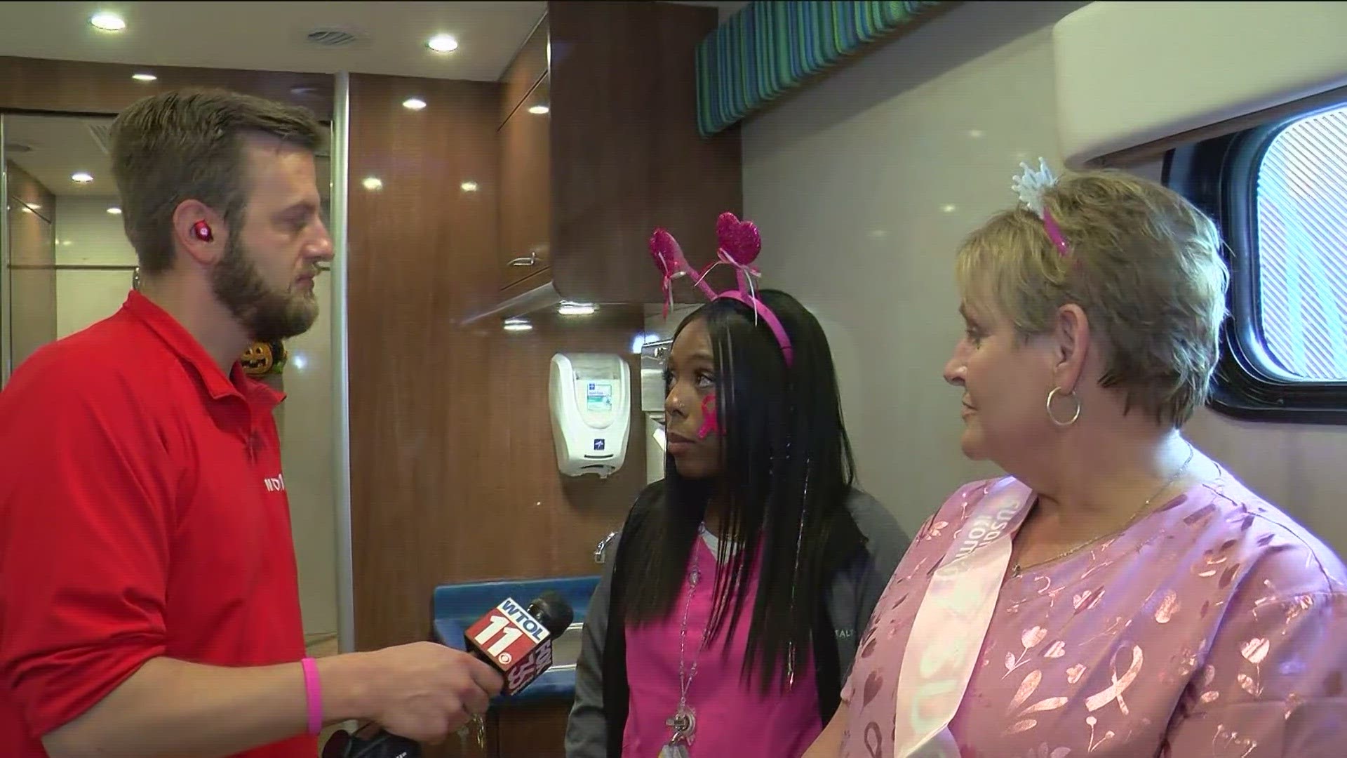 Jon Monk talks to Jamie and Ashley of the Mobile Mammogram bus, where breast cancer detection can begin. A participant also talks about his purpose in running.