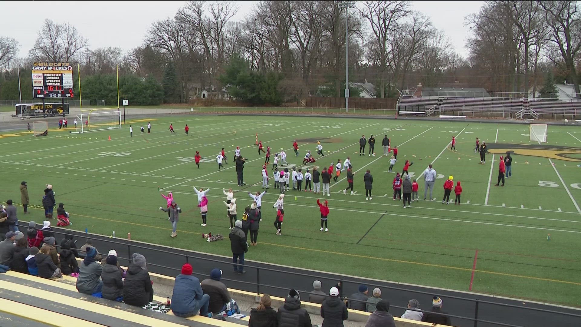 With cheerleaders on the sidelines and fans in the stands, Highland Elementary students took part in a holiday tradition: football.