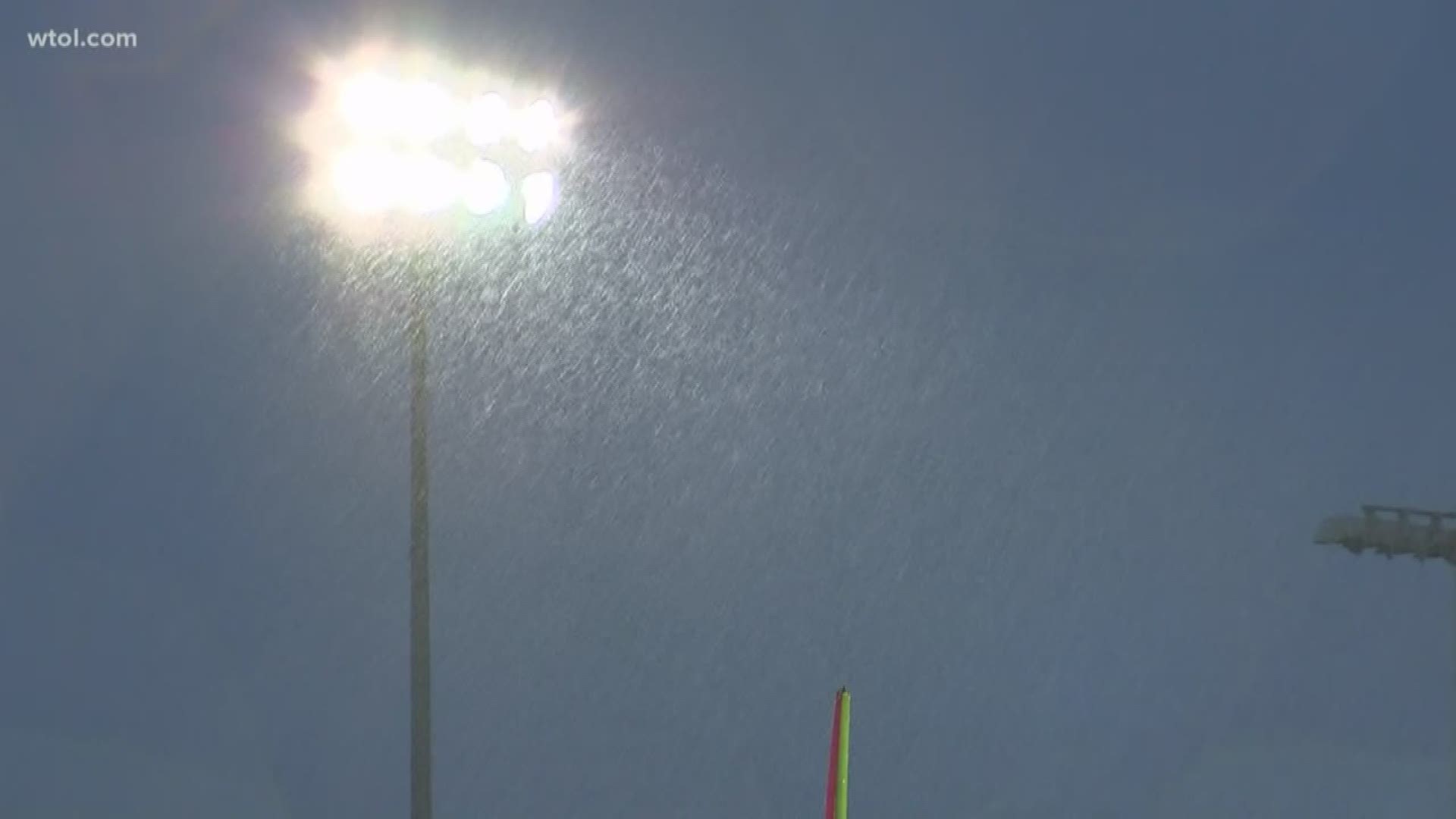 A crew of six spends hours getting the Genoa football field ready for each and every game.