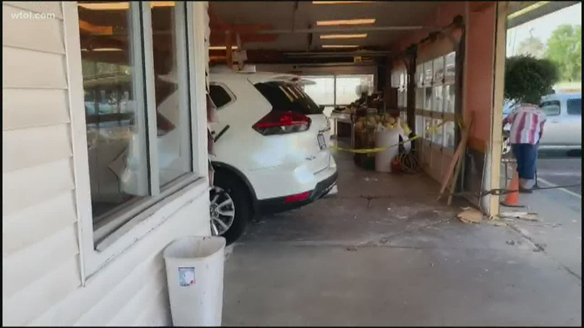 Witnesses say an older couple drove into the store around 6 p.m. on Saturday.