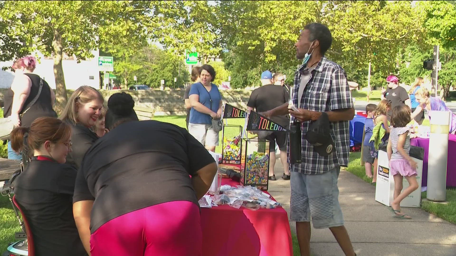 Out on the Toledo Public Library's Main Branch side lawn was an event aimed at inclusion and representation. This was the library's first Family Pride Night.