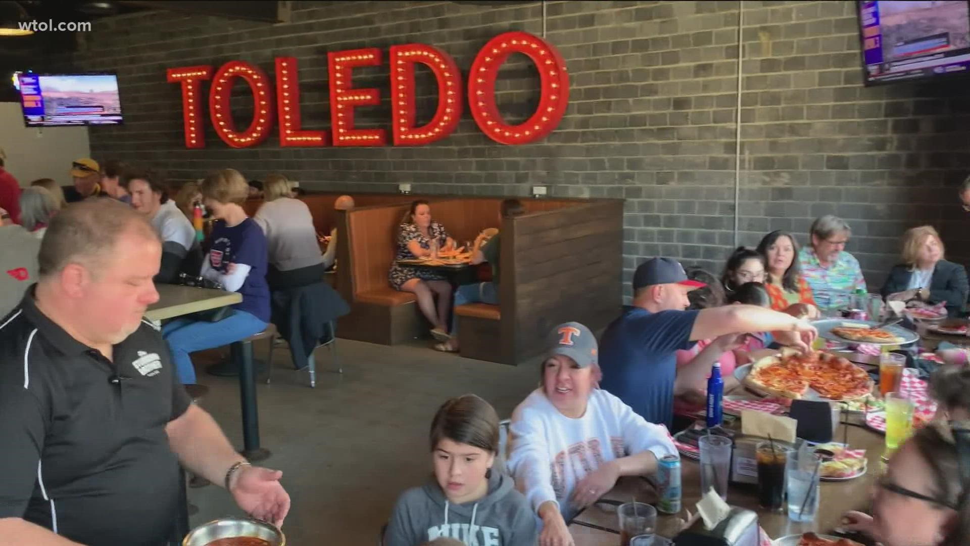 Restaurant owners and staff are happy to see tables full of basketball fans on a Wednesday night.