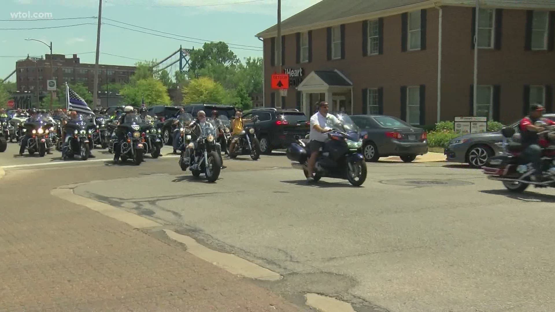 About 500 motorcyclists rode from S. Superior St. to the Safety Building where Sheriff John Tharp and Chief George Kral spoke to a large crowd.