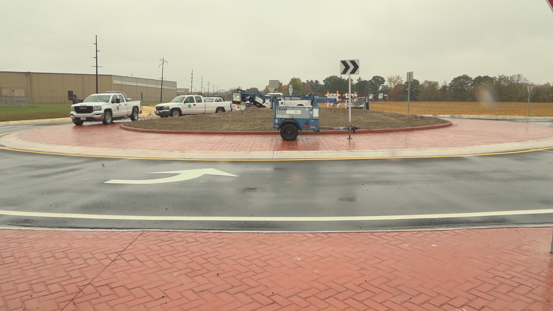 The roundabout is part of a multi-million dollar project to extend Industrial Drive across the Maumee River and connect with OH-110.