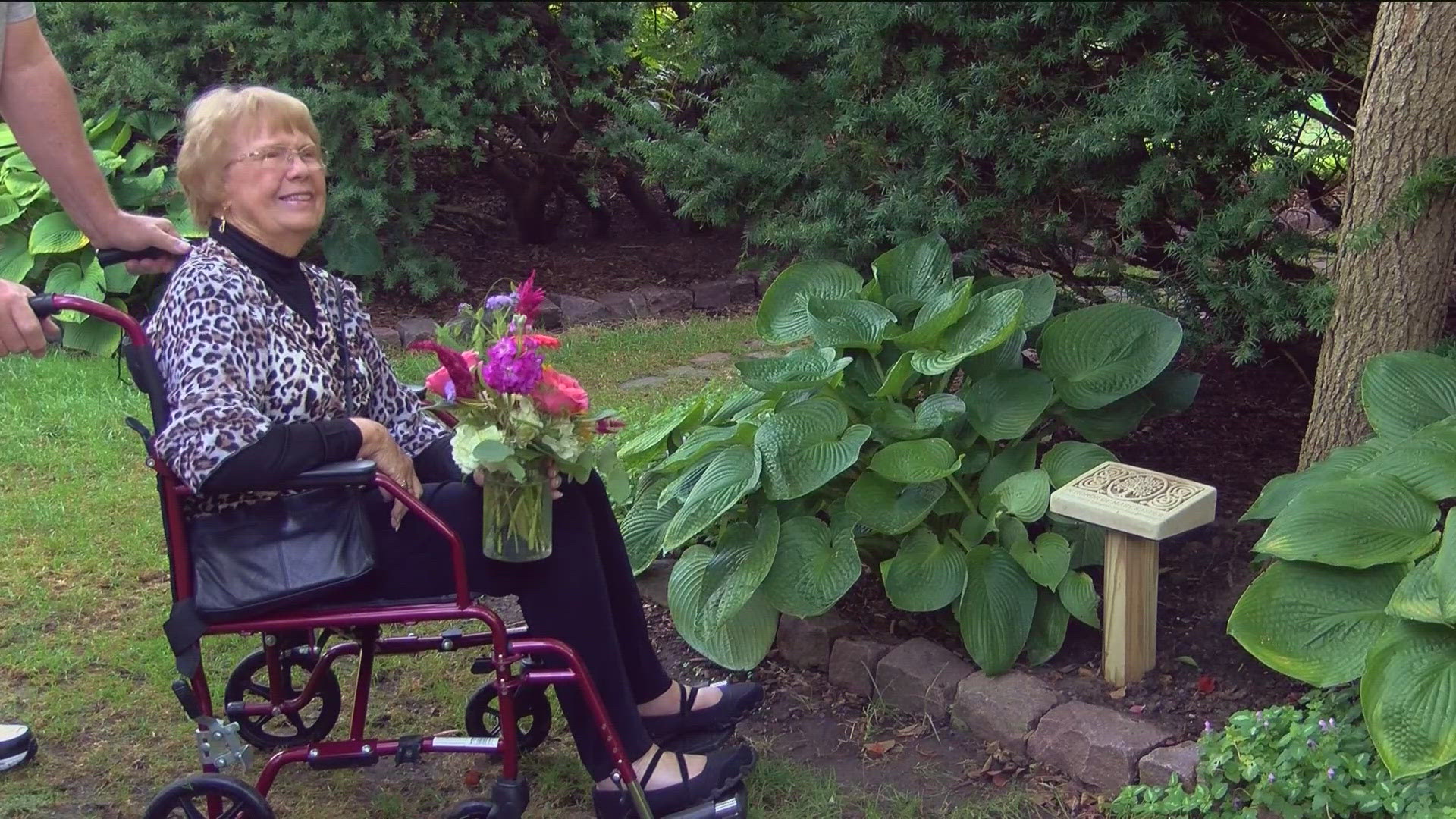 The zoo placed a plaque in the Botanical Gardens to recognize Mary Kasper for her longstanding membership.