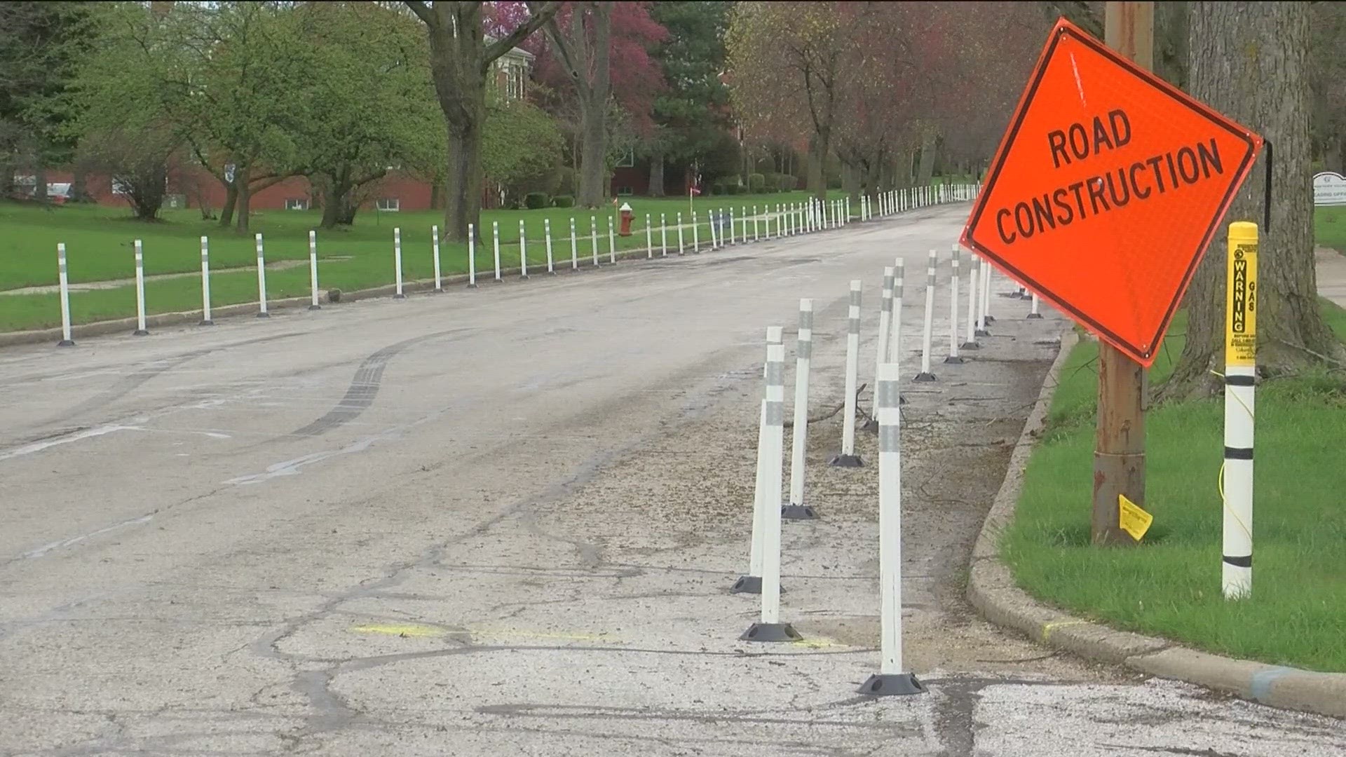 The city of Toledo added flexi-posts to narrow a west Toledo in hopes of reducing speeding. But residents say it has had an opposite effect.