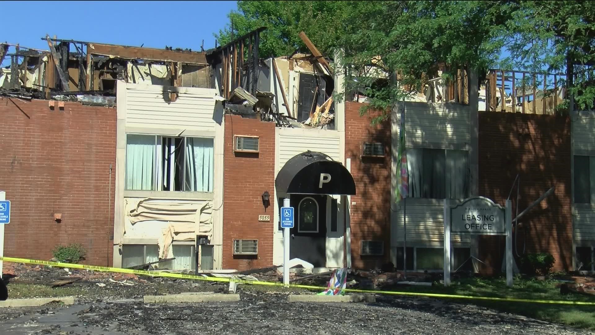Flames broke out at Miracle Manor Apartments Sunday. Three people were injured, including two firefighters.