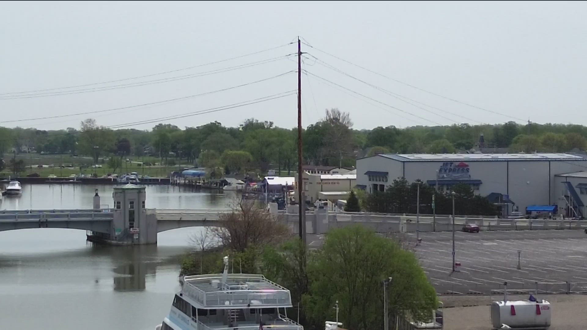 Low-hanging cables at a Port Clinton marina are preventing boats from going out to sea. One business owner said the obstacle is cutting into his income.