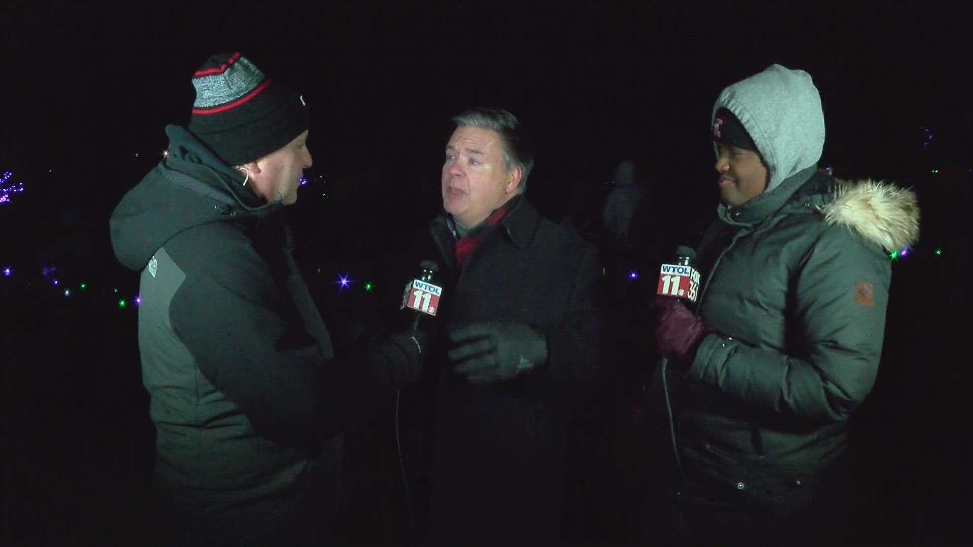 Representing event sponsor KeyBank, Mark Knierim talks about the Lights Before Christmas at the Toledo Zoo.