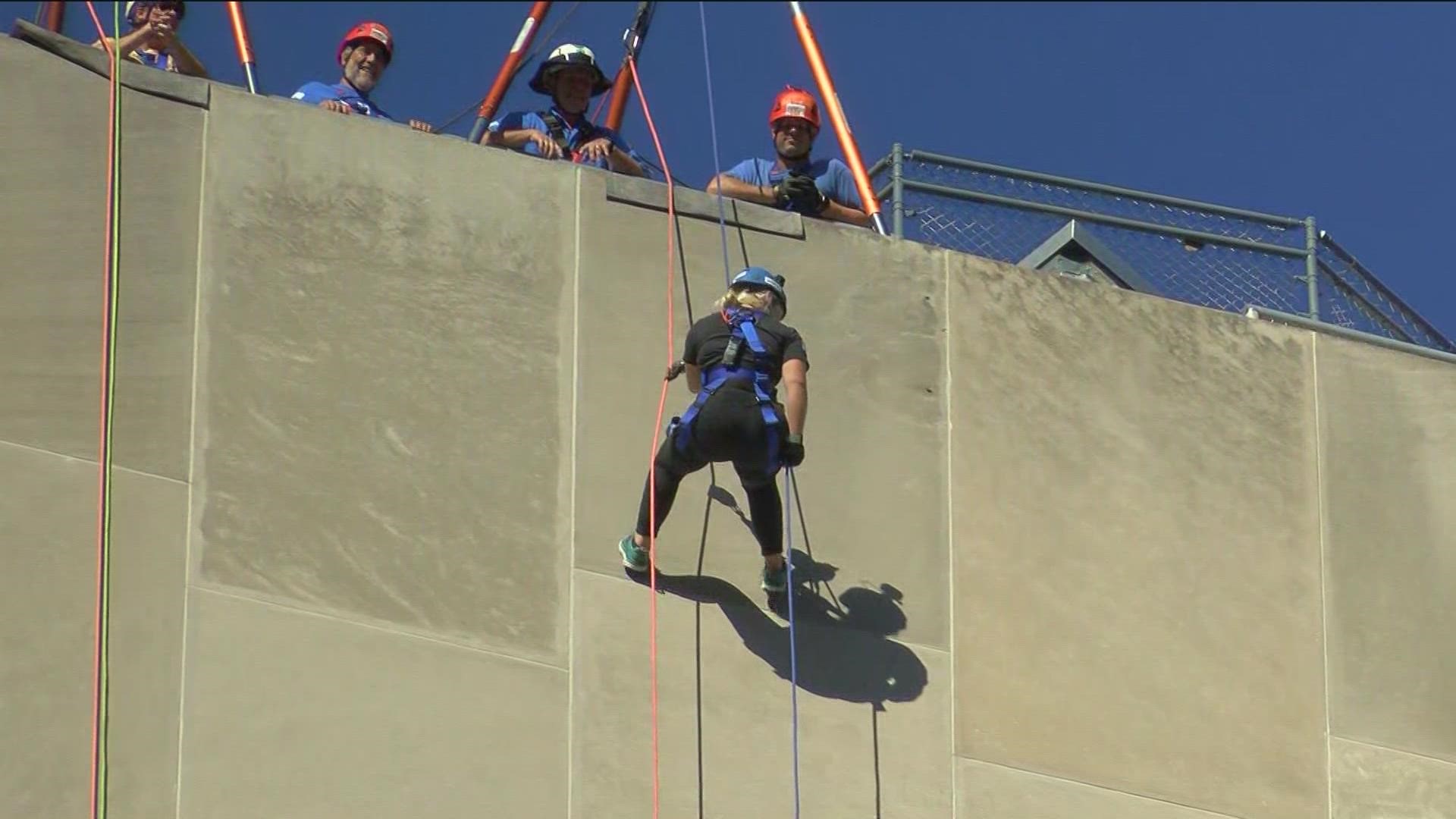 The yearly event, 'Over the Edge for Victory,' raises money for The Victory Center, which provides non-medical care to cancer patients and survivors for free.