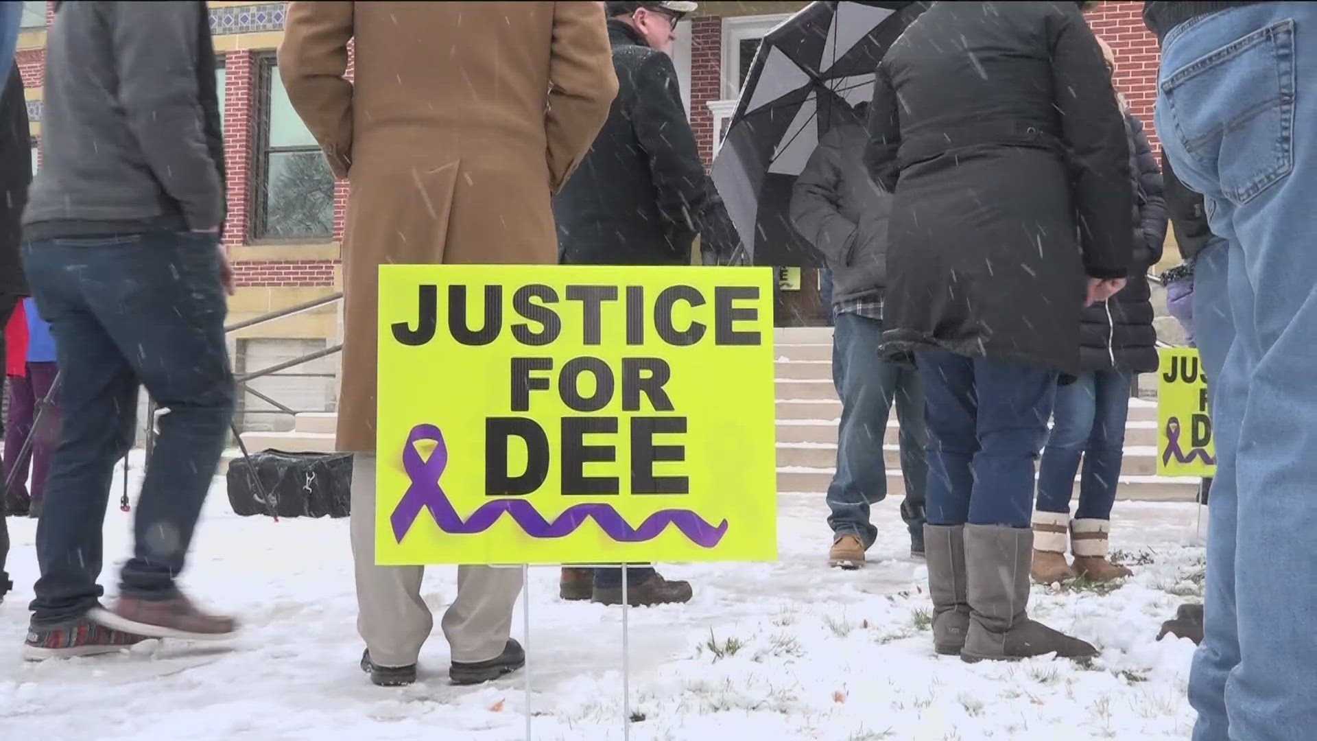 The 'Justice for Dee' group stood outside the old Lenawee County Courthouse Sunday, remembering the life of Dee Warner, hoping to bring more awareness to the case.