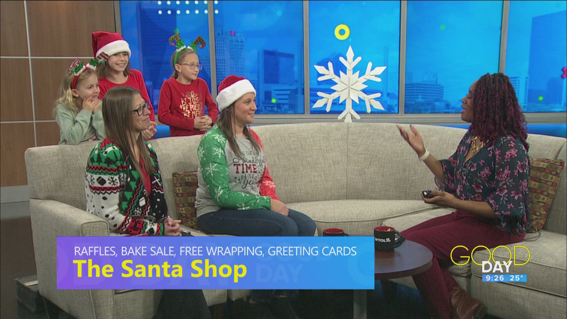 Girl Scout leader Nicole Bowlus and Stephanie Aspacher with Izzy, Lydia and Madelyn talk 'The Santa Shop'.