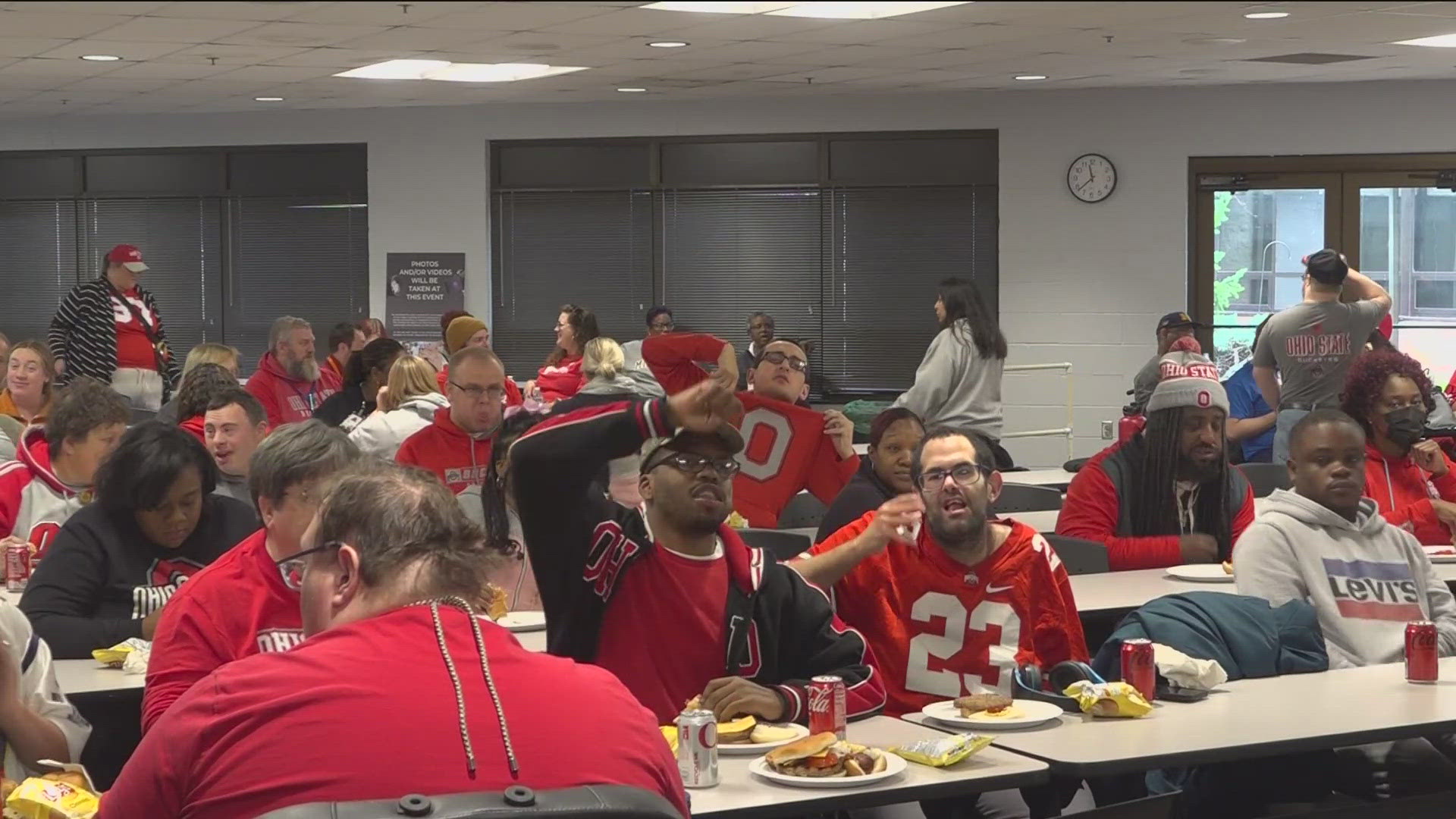 The third-annual tailgate brought dozens of people out in their Ohio State and Michigan gear.