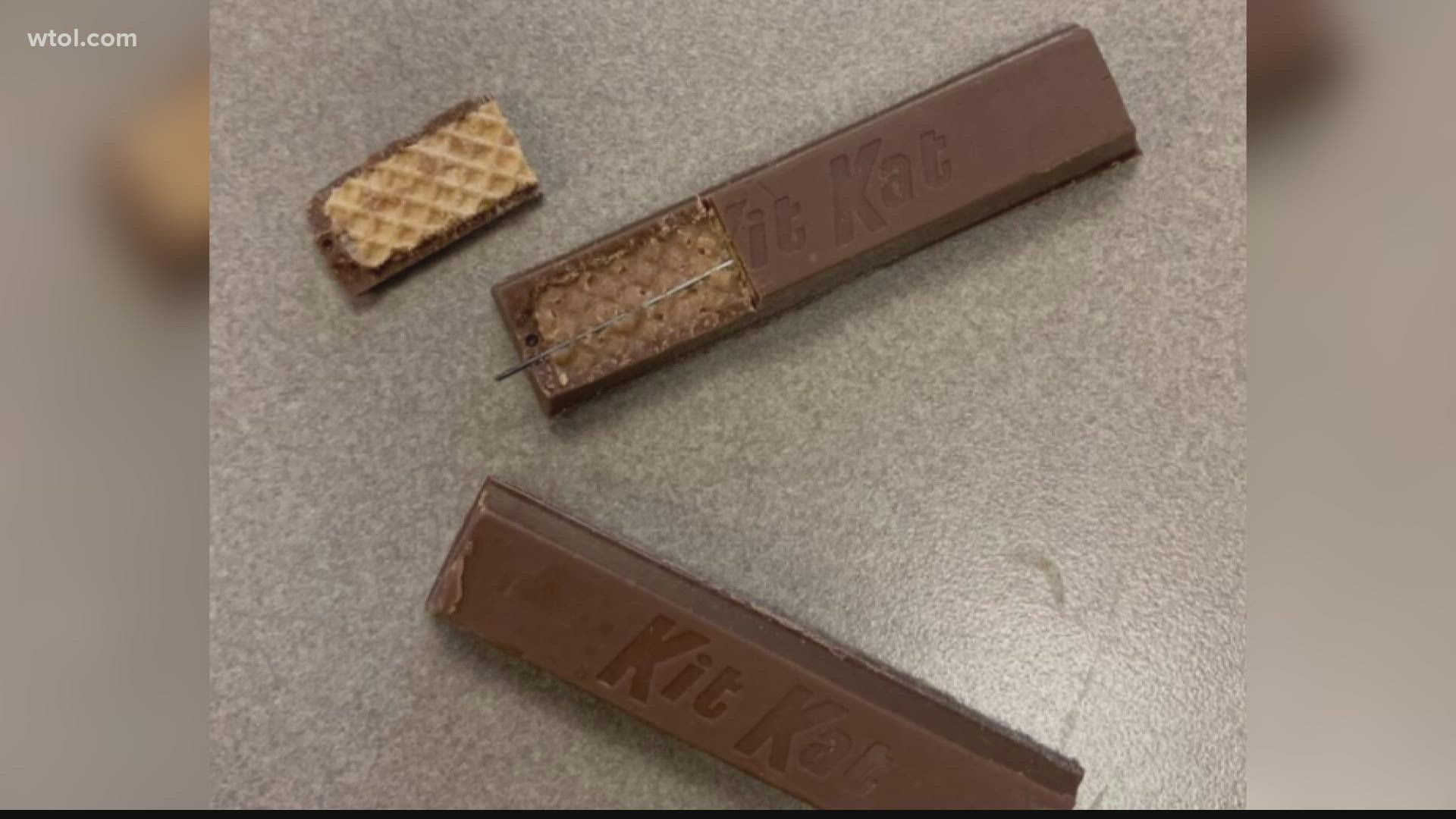 Fostoria police said two pieces of candy were reported to have sewing needles in them.