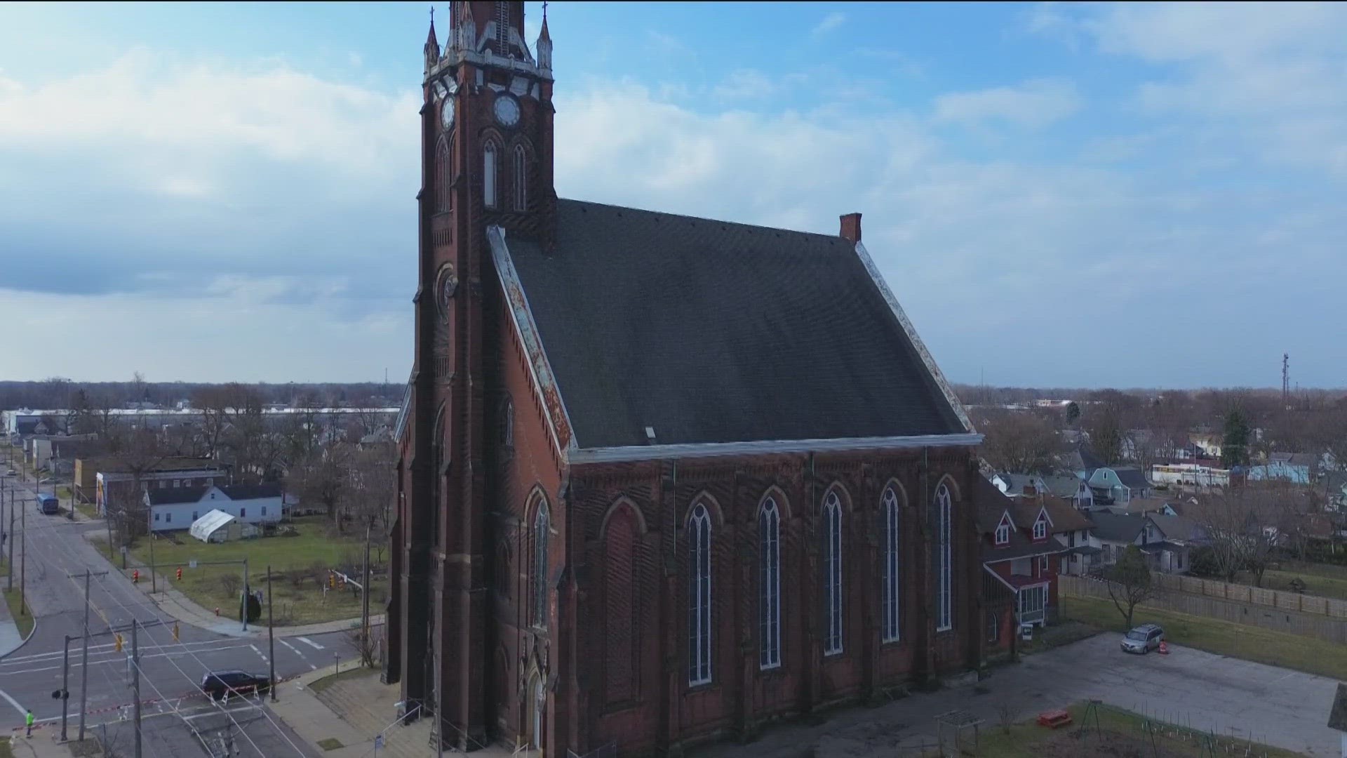 After some bricks fell from the now-closed church in central Toledo, officials with the Lucas County Land Bank say they're still committed to rehabilitating it.